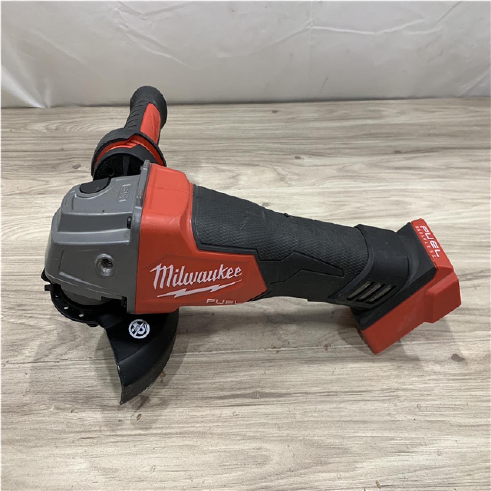 AS-IS Milwaukee FUEL 18V Lithium-Ion Brushless Cordless 4-1/2 in./5 in. Grinder w/Paddle Switch (Tool-Only)