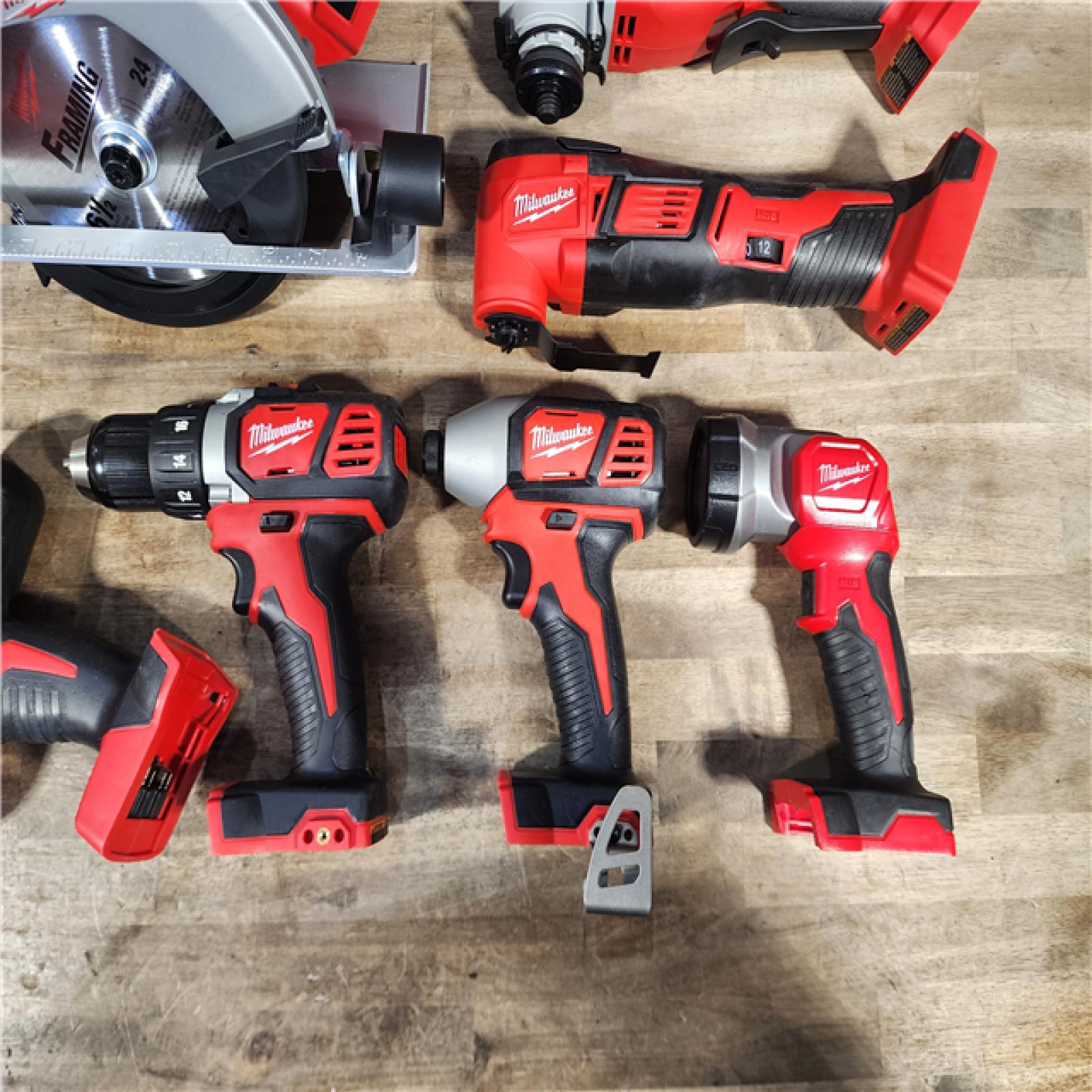 HOUSTON LOCATION - AS-IS MILWAUKEE 7 TOOL COMBO KIT W/ (2) BATTERY & CHARGER