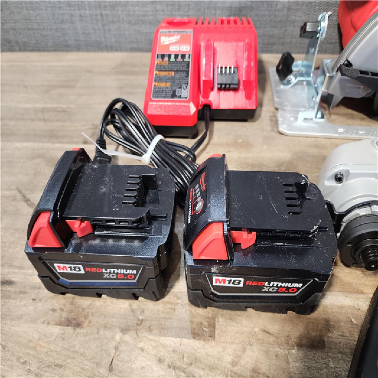 HOUSTON LOCATION - AS-IS Milwaukee M18 18-Volt Lithium-Ion Cordless Combo Kit (9-Tool) with (2) Batteries  Charger  and Tool Bag