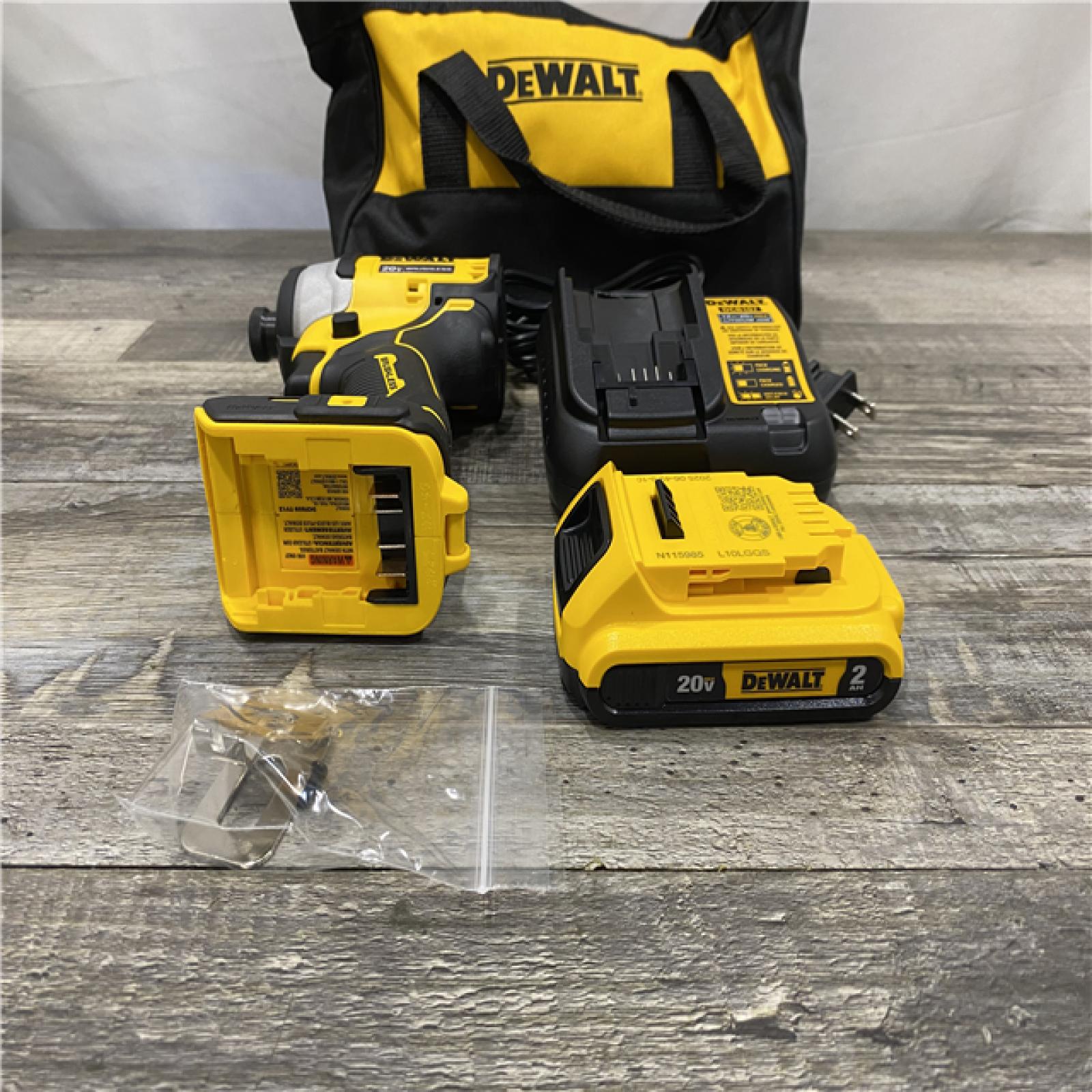 AS-IS DEWALT Atomic 20V Max Lithium-Ion Brushless Cordless Compact 1/4 in. Impact Driver Kit