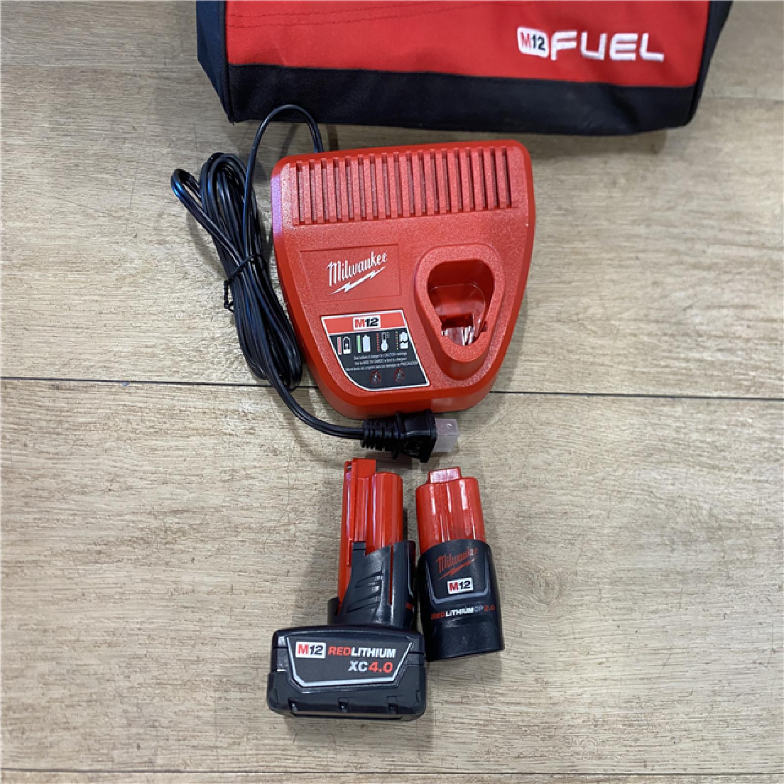 AS-IS Milwaukee FUEL 12-Volt Lithium-Ion Brushless Cordless Hammer Drill and Impact Driver Combo Kit