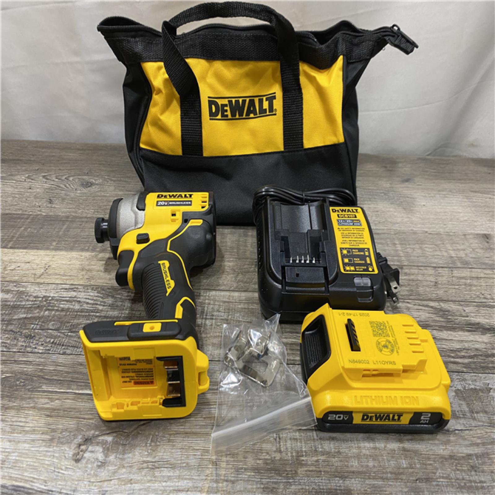 AS-IS DEWALT Atomic 20V Max Lithium-Ion Brushless Cordless Compact 1/4 in. Impact Driver Kit