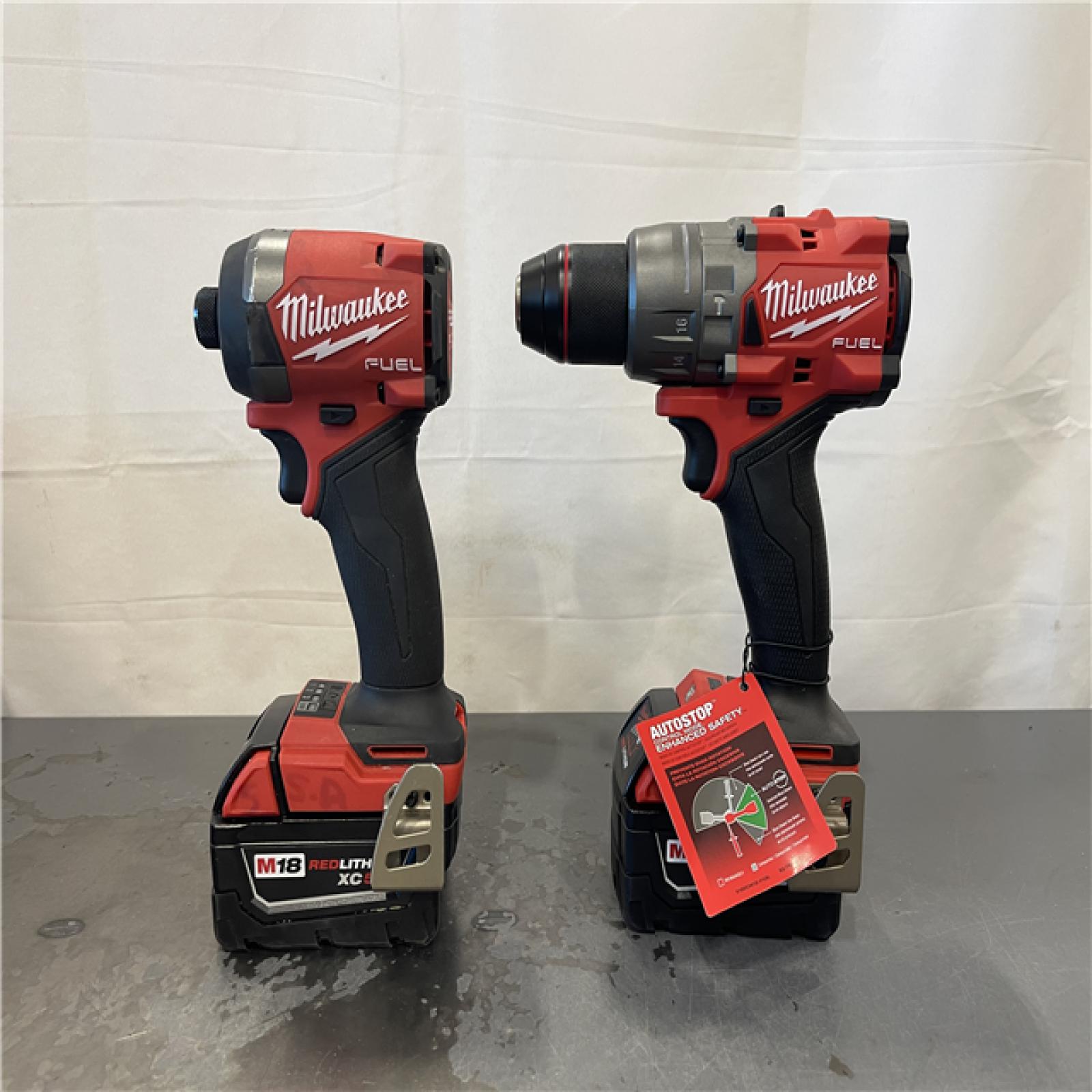 AS-IS- MILWAUKEE FUEL 18V Lithium-Ion Brushless Cordless Hammer Drill and Impact Driver Combo Kit