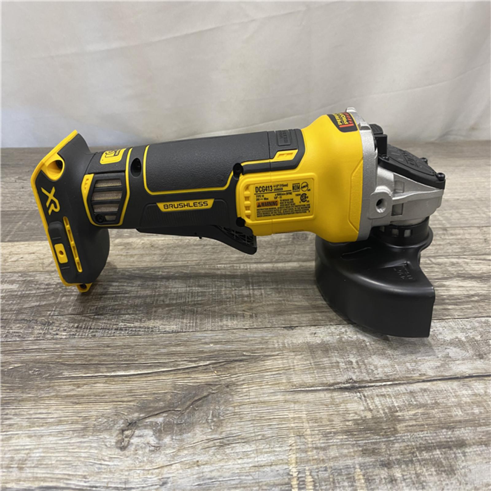 AS-IS DEWALT 20V MAX XR Cordless Brushless 4.5 in. Paddle Switch Small Angle Grinder with Kickback Brake (Tool Only)