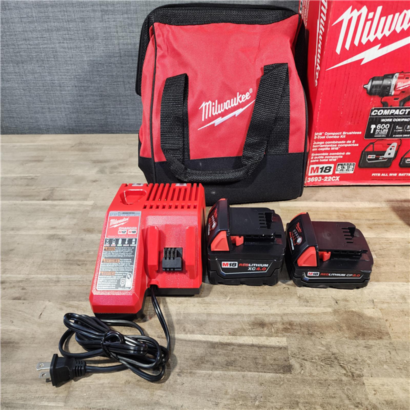 HOUSTON LOCATION - AS-IS M18 18-Volt Lithium-Ion Brushless Cordless Compact Hammer Drill/Impact Combo Kit (2-Tool) with (2) Batteries, Bag