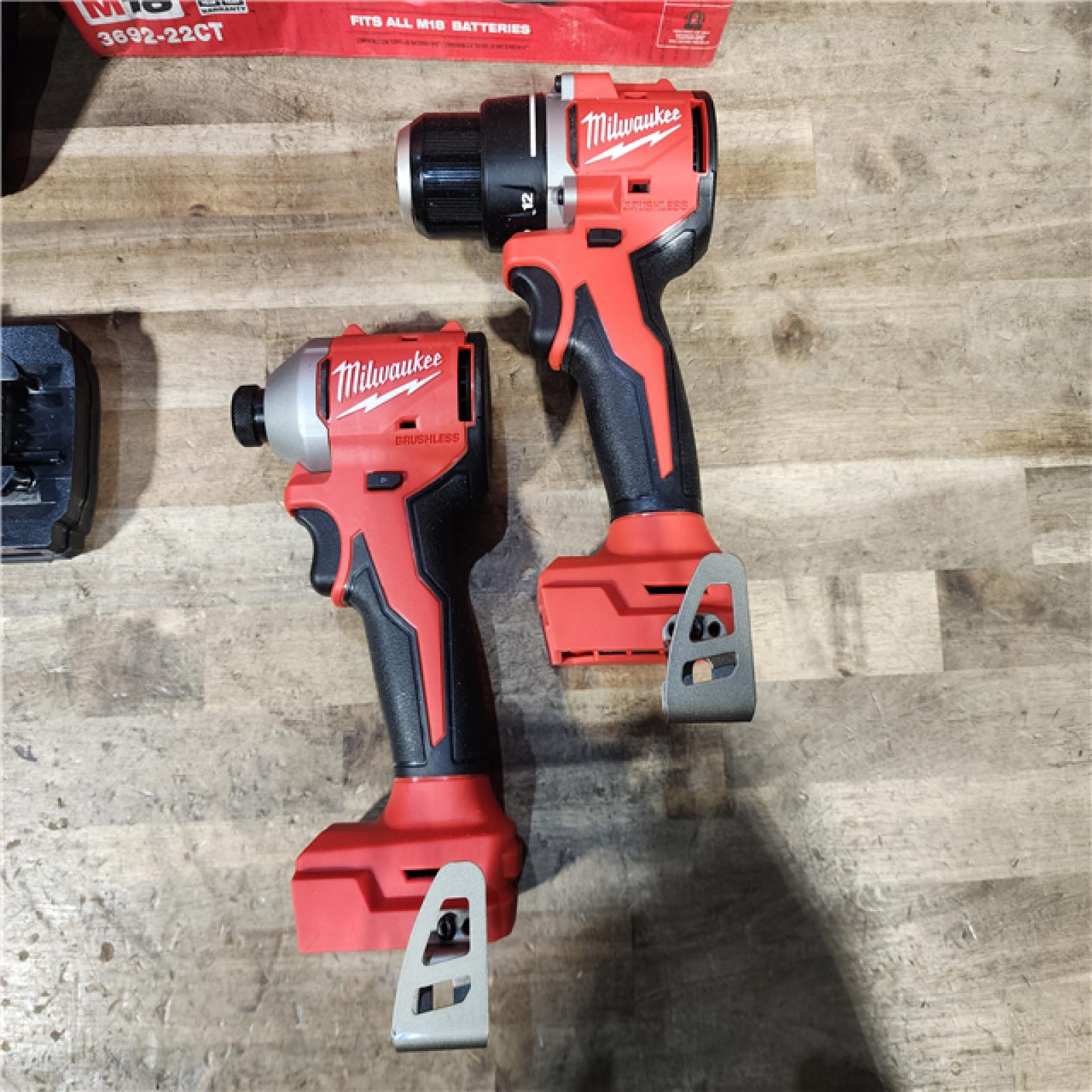 HOUSTON LOCATION - AS-IS Milwaukee M18 18V Lithium-Ion Brushless Cordless Compact Drill/Impact Combo Kit (2-Tool) W/(2) 2.0 Ah Batteries, Charger & Bag