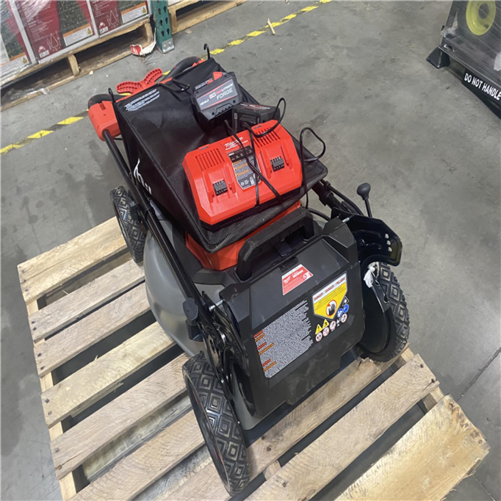 Dallas Location - As-Is 	Milwaukee 18 FUEL 21 Self-Propelled Dual Battery Mower Kit