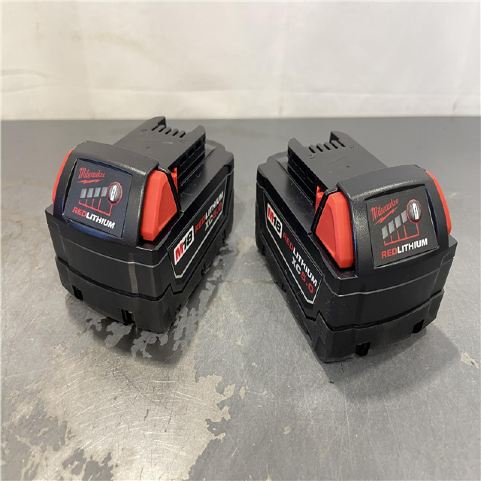AS-IS - Milwaukee M18 18-Volt Lithium-Ion XC Starter Kit with Two 5.0Ah Batteries and Charger