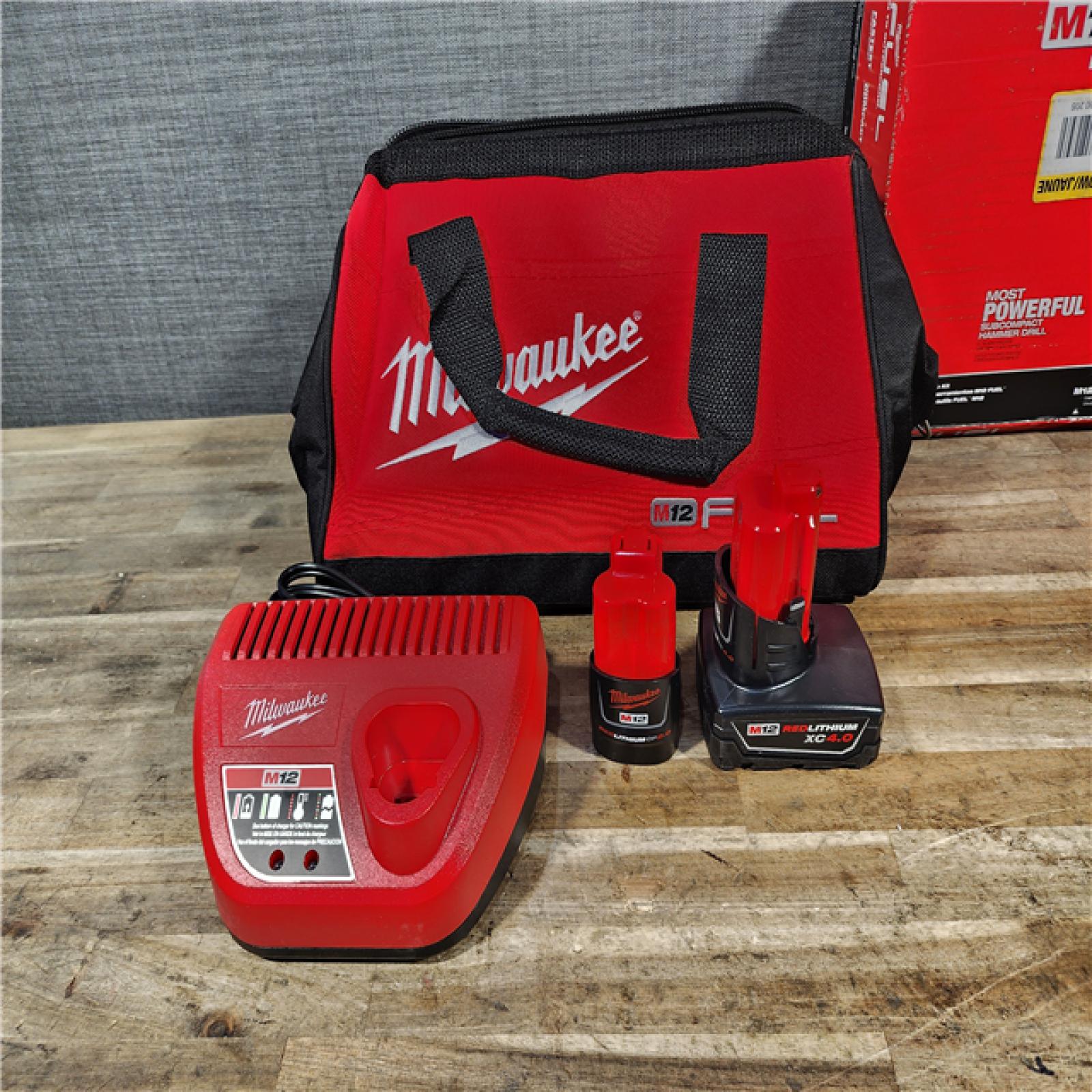 HOUSTON LOCATION - AS-IS Milwaukee FUEL 12-Volt Lithium-Ion Brushless Cordless Hammer Drill and Impact Driver Combo Kit