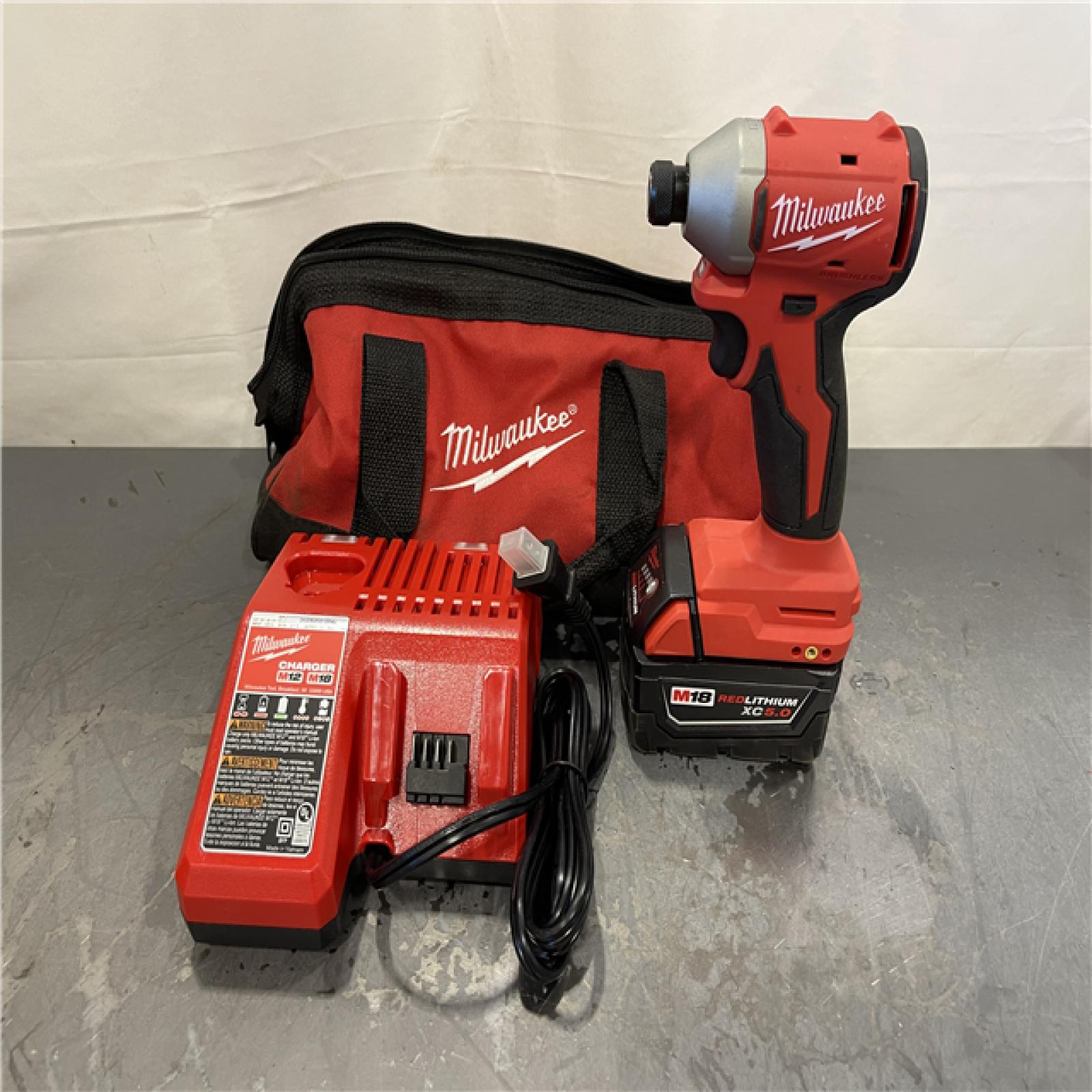 AS-IS - Milwaukee M18 18-Volt Lithium-Ion Brushless Cordless 1/4 in. Compact Impact Driver Kit