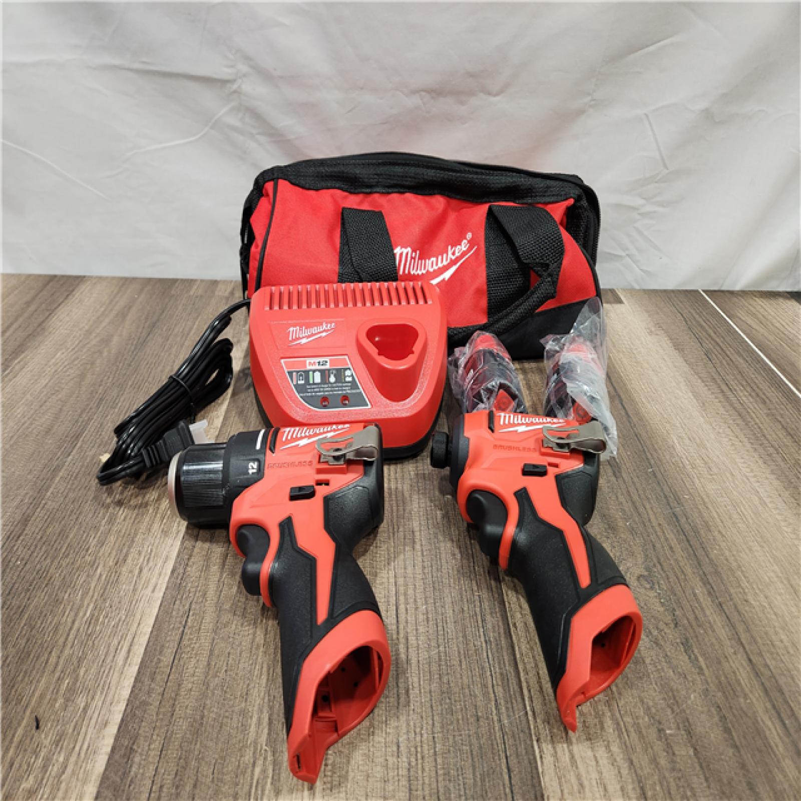 AS-IS Milwaukee M18 FUEL 18V Lithium-Ion Brushless Cordless Hammer Drill and Impact Driver Combo Kit (2-Tool) with 2 Batteries