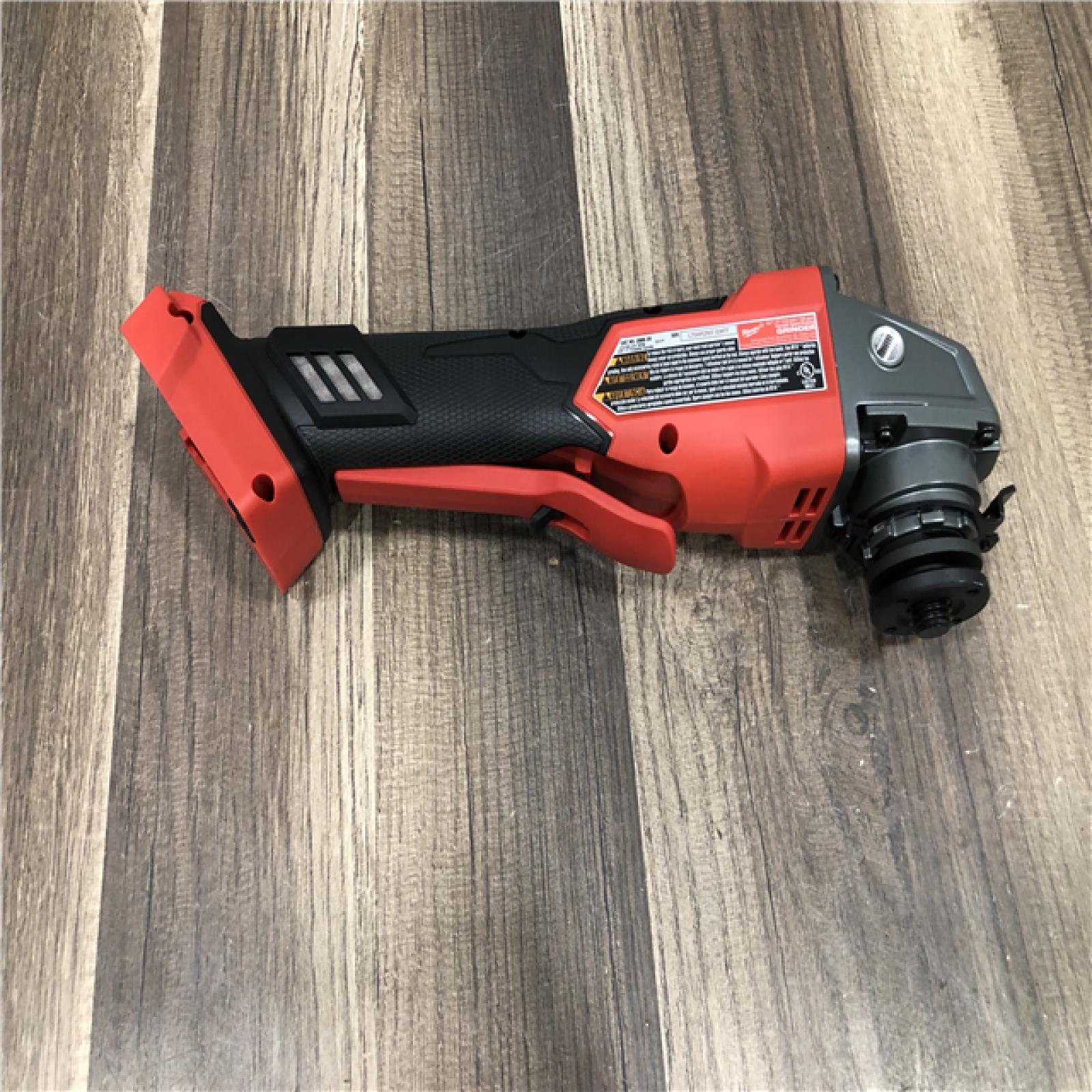 AS-IS Milwaukee FUEL 18V Lithium-Ion Brushless Cordless 4-1/2 in./5 in. Grinder with Variable Speed & Paddle Switch (Tool-Only)