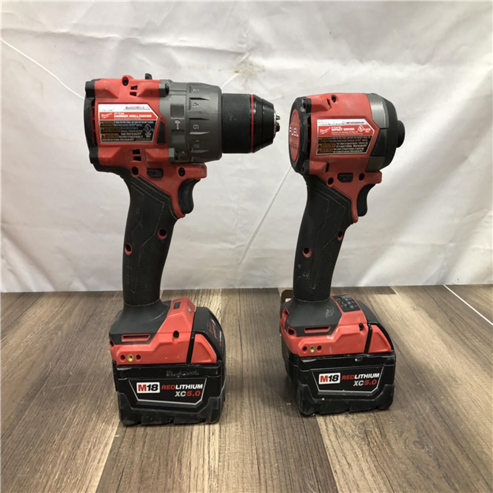 AS-IS Milwaukee FUEL 18V Lithium-Ion Brushless Cordless Hammer Drill and Impact Driver Combo Kit