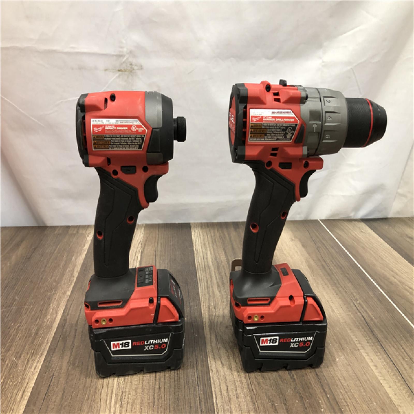 AS-IS Milwaukee FUEL 18V Lithium-Ion Brushless Cordless Hammer Drill and Impact Driver Combo Kit