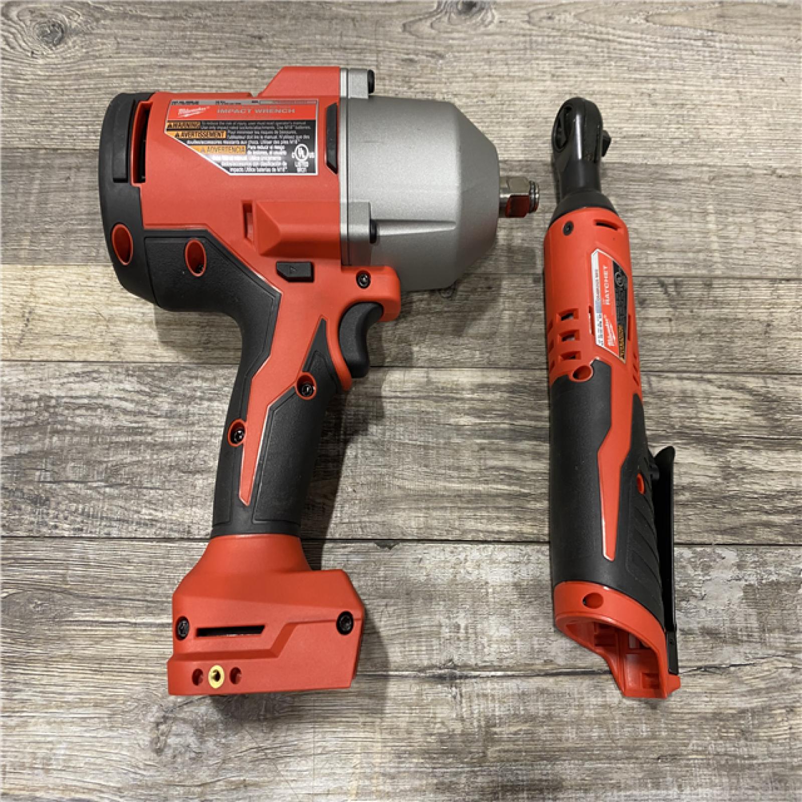 AS-IS Milwaukee 12/18V Lithium-Ion Cordless 3/8 in. Ratchet and 1/2 in. High Torque Impact Wrench with Friction Ring Combo Kit