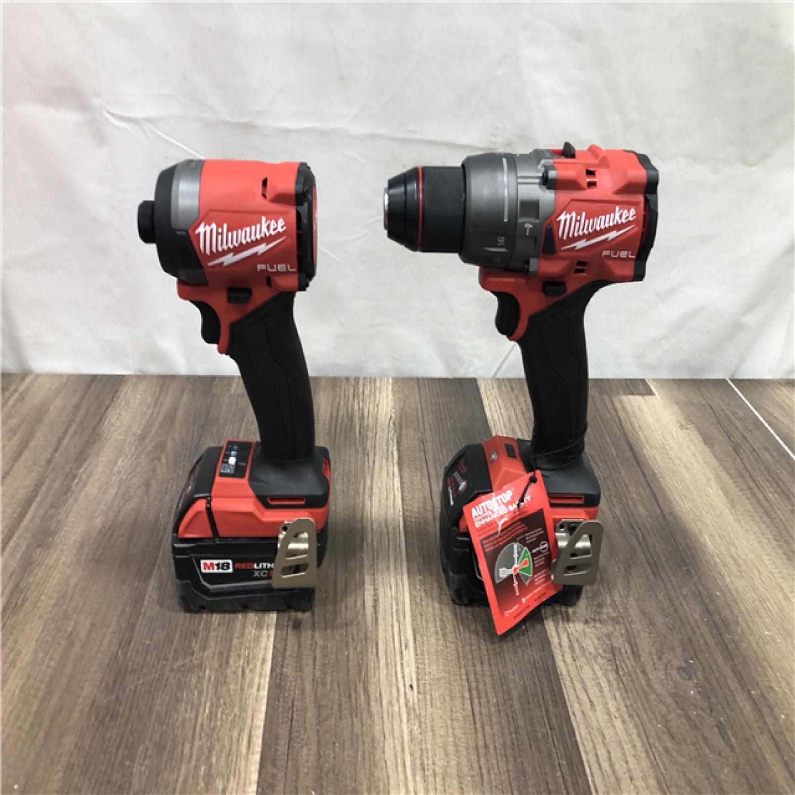 AS-IS Milwaukee  FUEL 18V Lithium-Ion Brushless Cordless Hammer Drill and Impact Driver Combo Kit