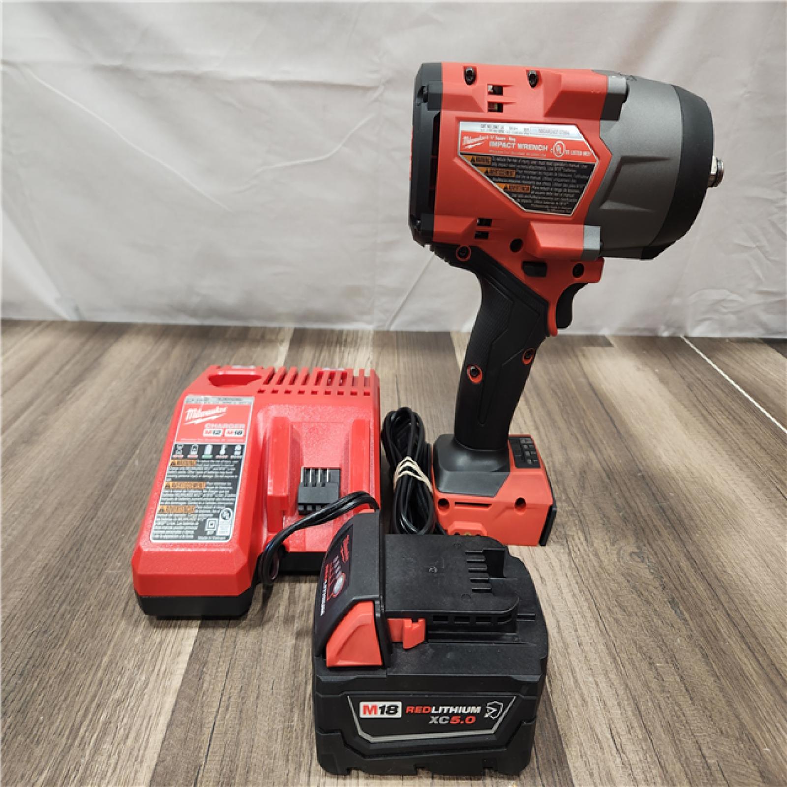 AS-IS- Milwaukee M18 1/2 in. Cordless Brushless High Torque Impact Wrench Kit (Battery & Charger)