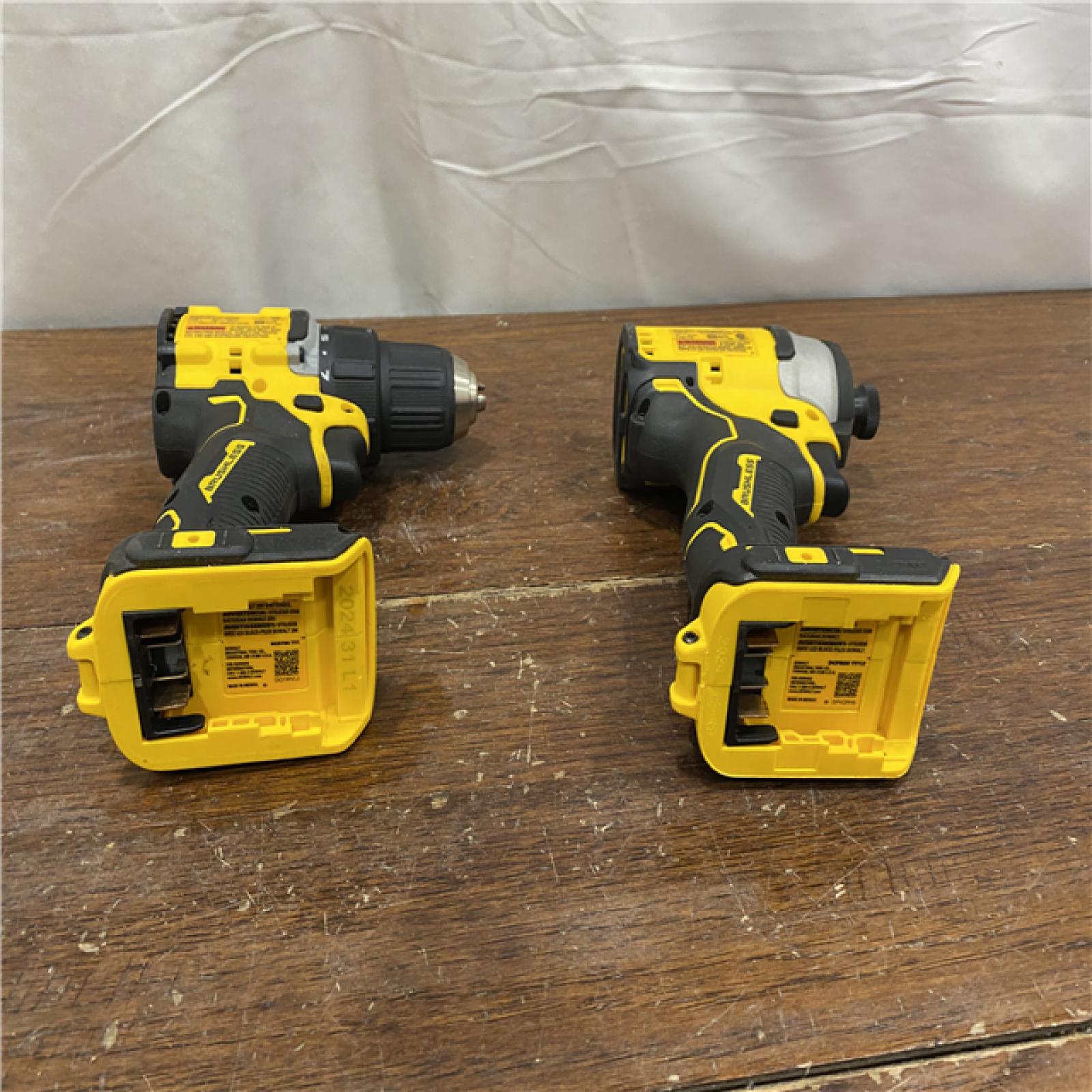 AS-IS Dewalt DCK225D2 20V MAX ATOMIC Brushless Compact Lithium-Ion 1/2 in. Cordless Drill Driver and 1/4 in. Impact Driver Combo Kit with 2 Batteries 2 Ah