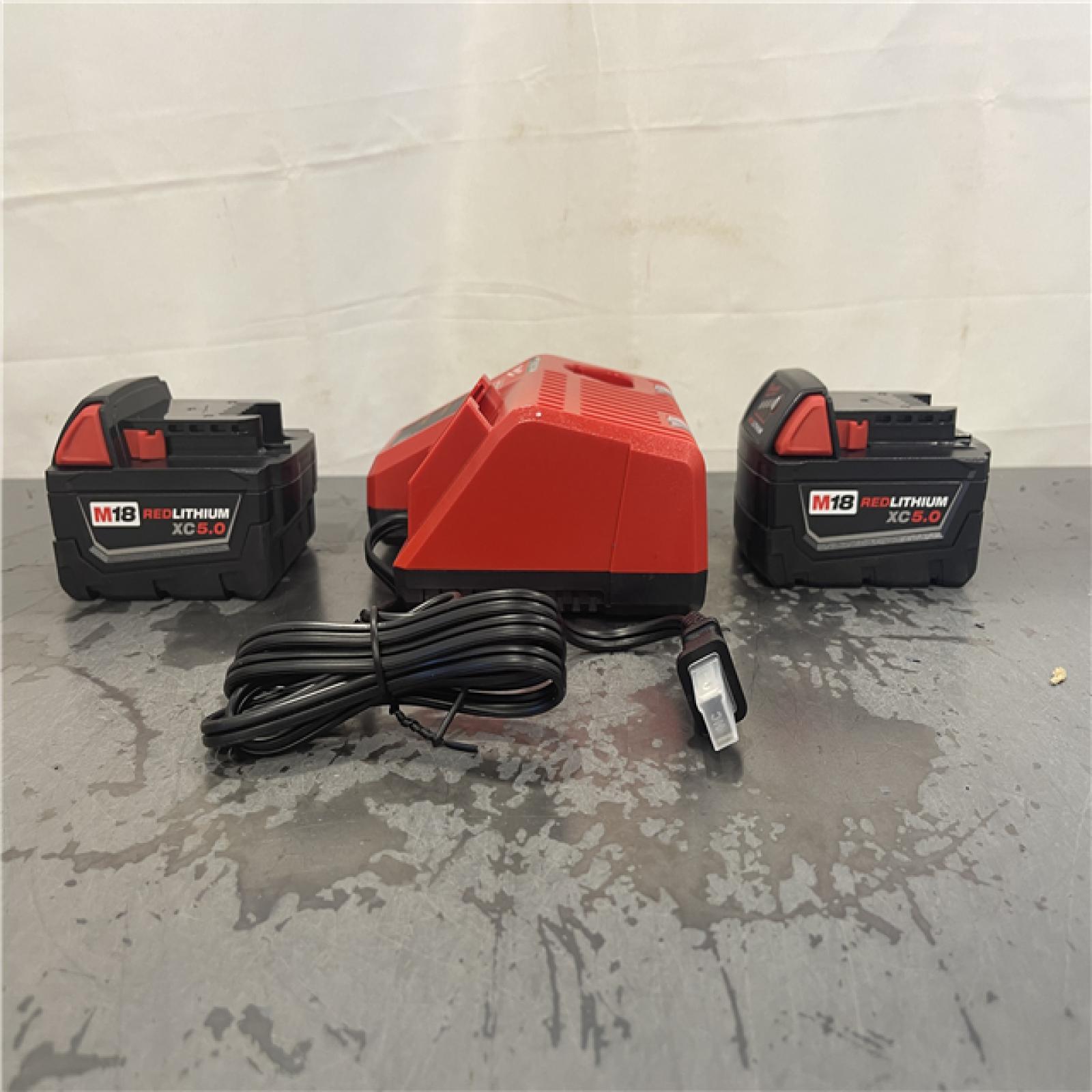 AS-IS- M18 18-Volt Lithium-Ion XC Starter Kit with Two 5.0Ah Batteries and Charger