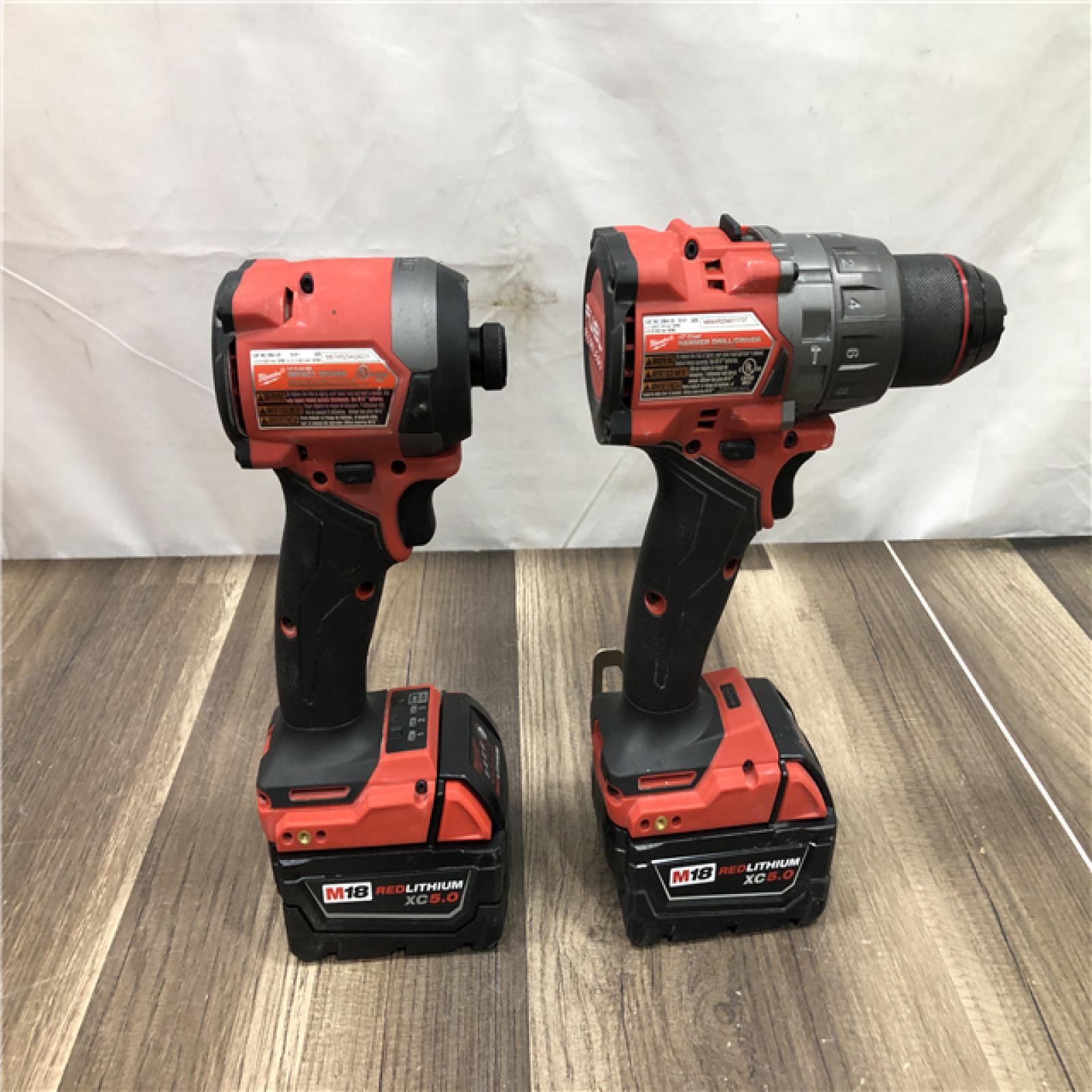 AS-IS Milwaukee FUEL 18V Lithium-Ion Brushless Cordless Hammer Drill and Impact Driver Combo Kit