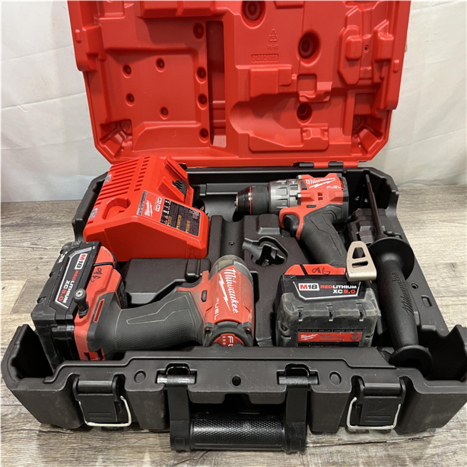 AS-IS Milwaukee FUEL 18V Lithium-Ion Brushless Cordless Hammer Drill and Impact Driver Combo Kit