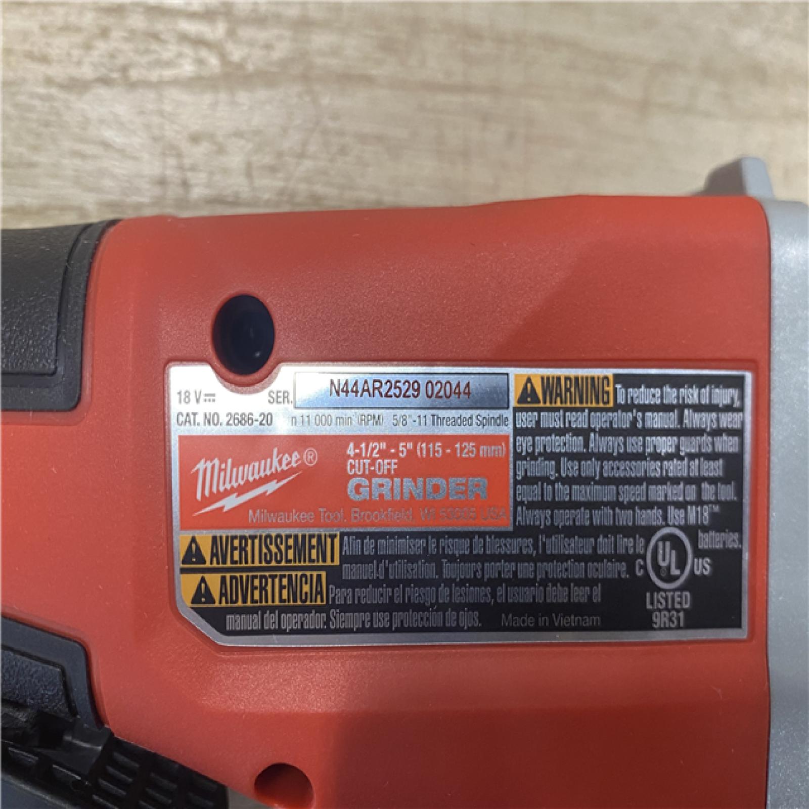AS-IS Milwaukee 18V Lithium-Ion Brushless Cordless 4-1/2 in./5 in. Grinder w/Paddle Switch (Tool-Only)
