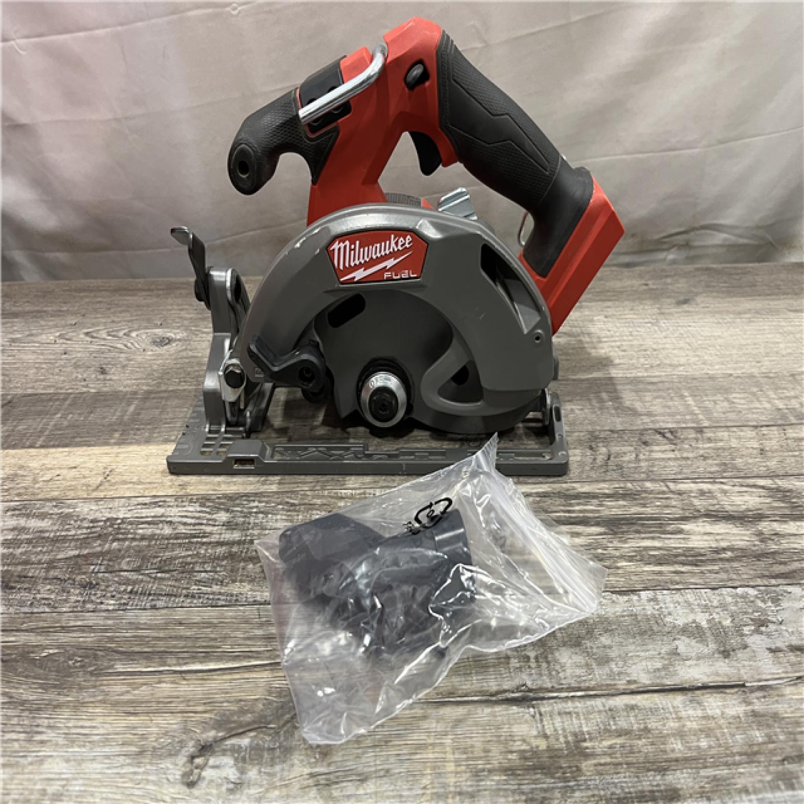 AS-IS Milwaukee FUEL 18V Lithium-Ion Brushless Cordless 6-1/2 in. Circular Saw (Tool-Only)