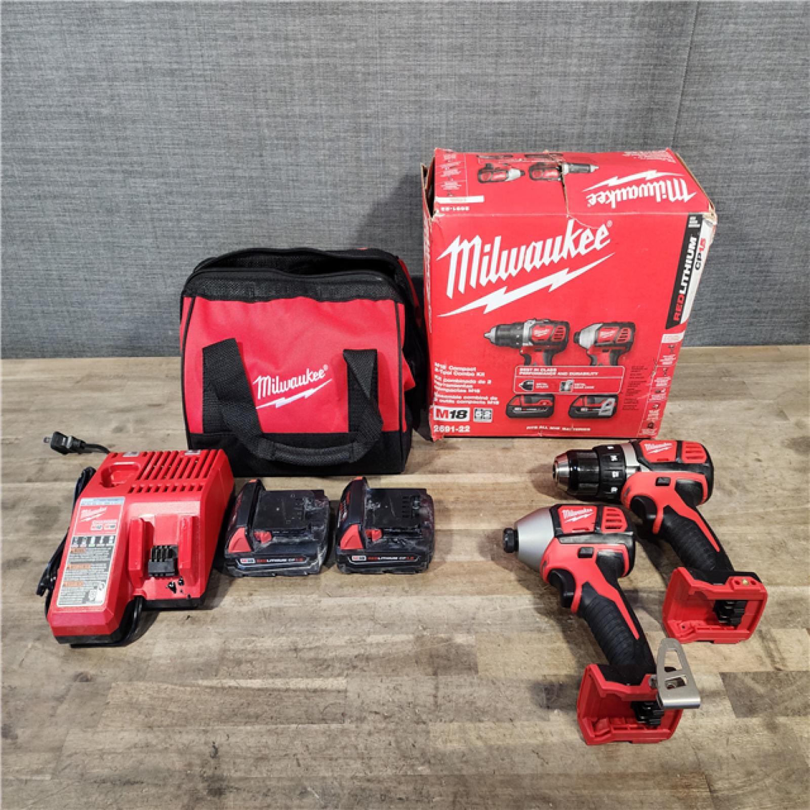 HOUSTON LOCATION - AS-IS Milwaukee 18V Cordless Brushed 2-Tool Drill/Driver and Impact Driver Kit