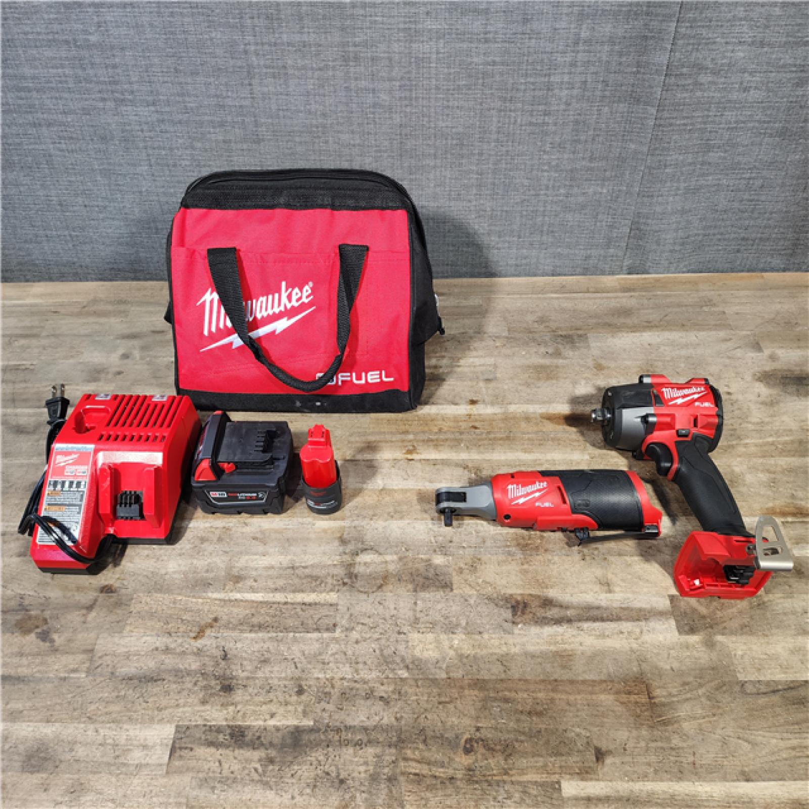 HOUSTON LOCATION - AS-IS Milwaukee 2 Tool Combo Kit W/ (2) Battery & Charger