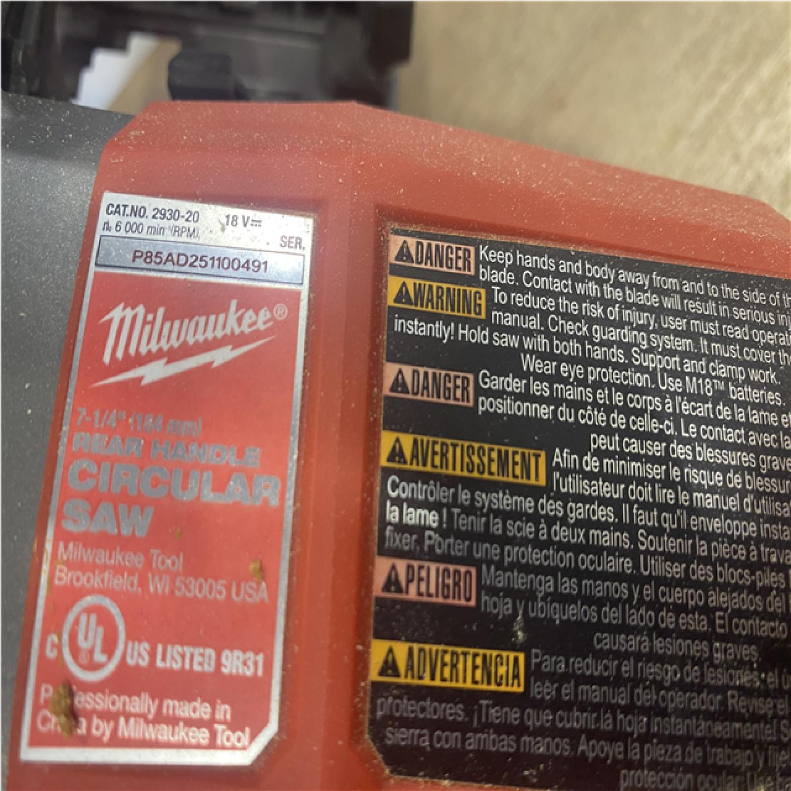 as-is Milwaukee FUEL 18V Lithium-Ion Cordless 7-1/4 in. Rear Handle Circular Saw (Tool-Only)