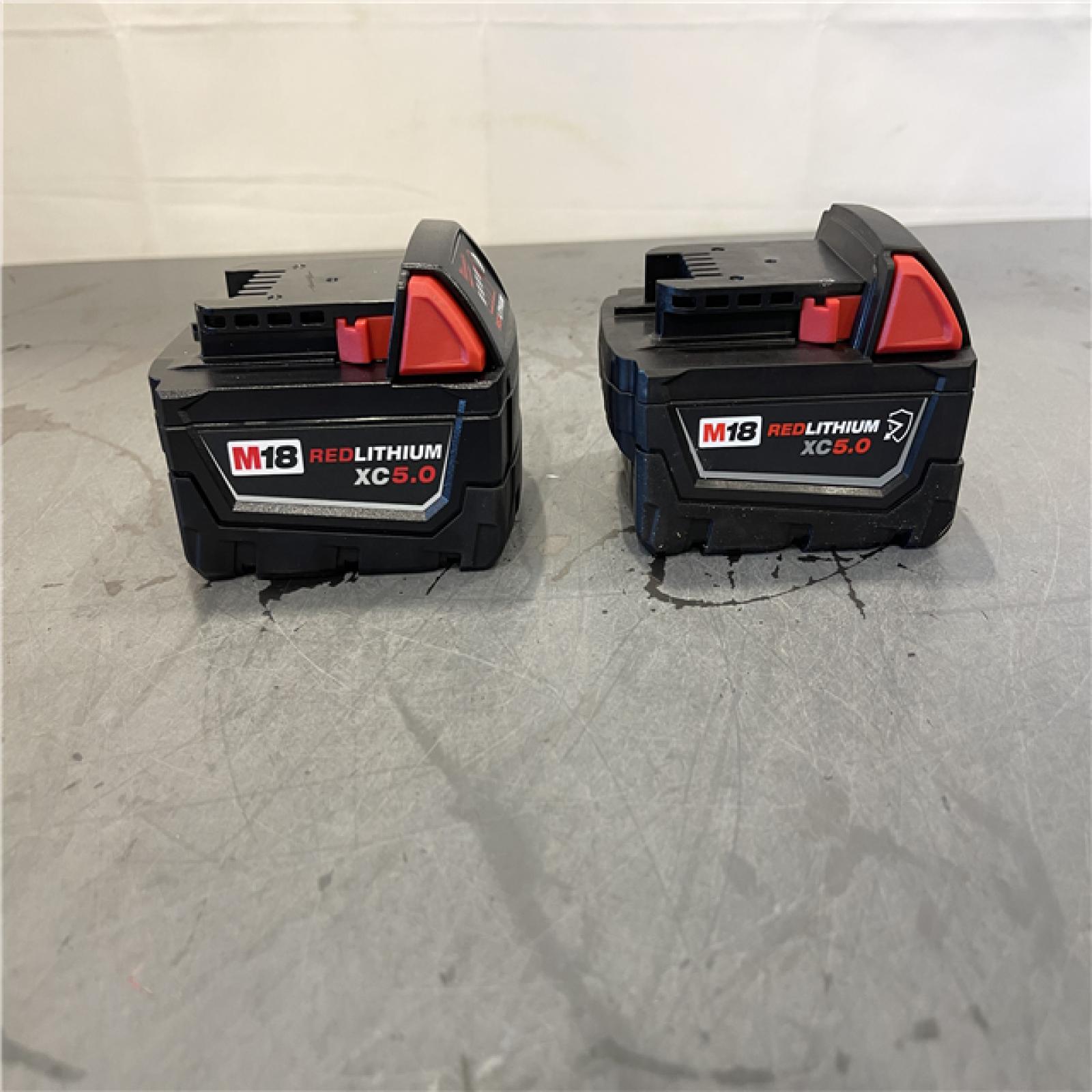 AS-IS - Milwaukee M18 18-Volt Lithium-Ion XC Starter Kit with Two 5.0Ah Batteries and Charger