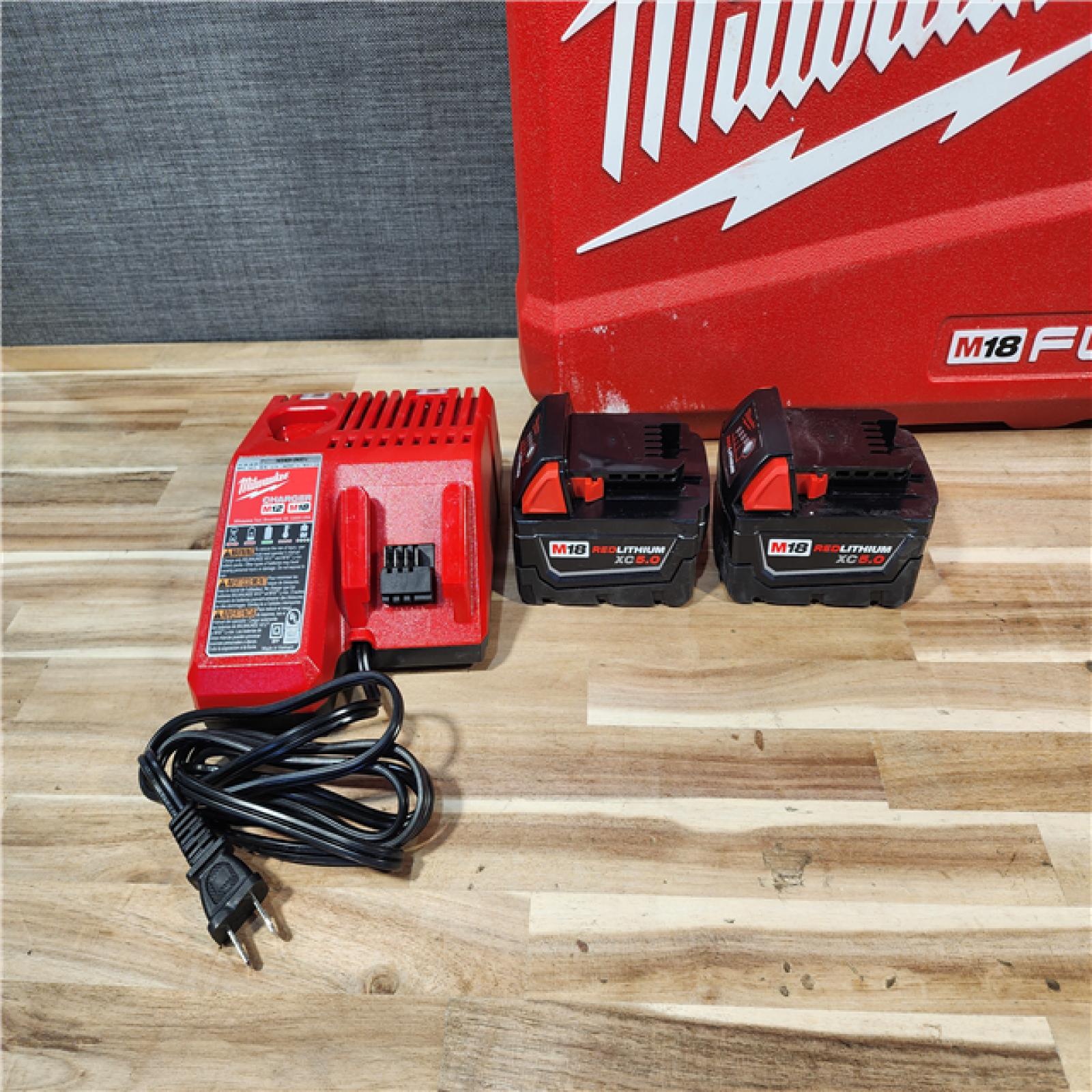 HOUSTON LOCATION - AS-IS Milwaukee  FUEL 18V Lithium-Ion Brushless Cordless Hammer Drill and Impact Driver Combo Kit