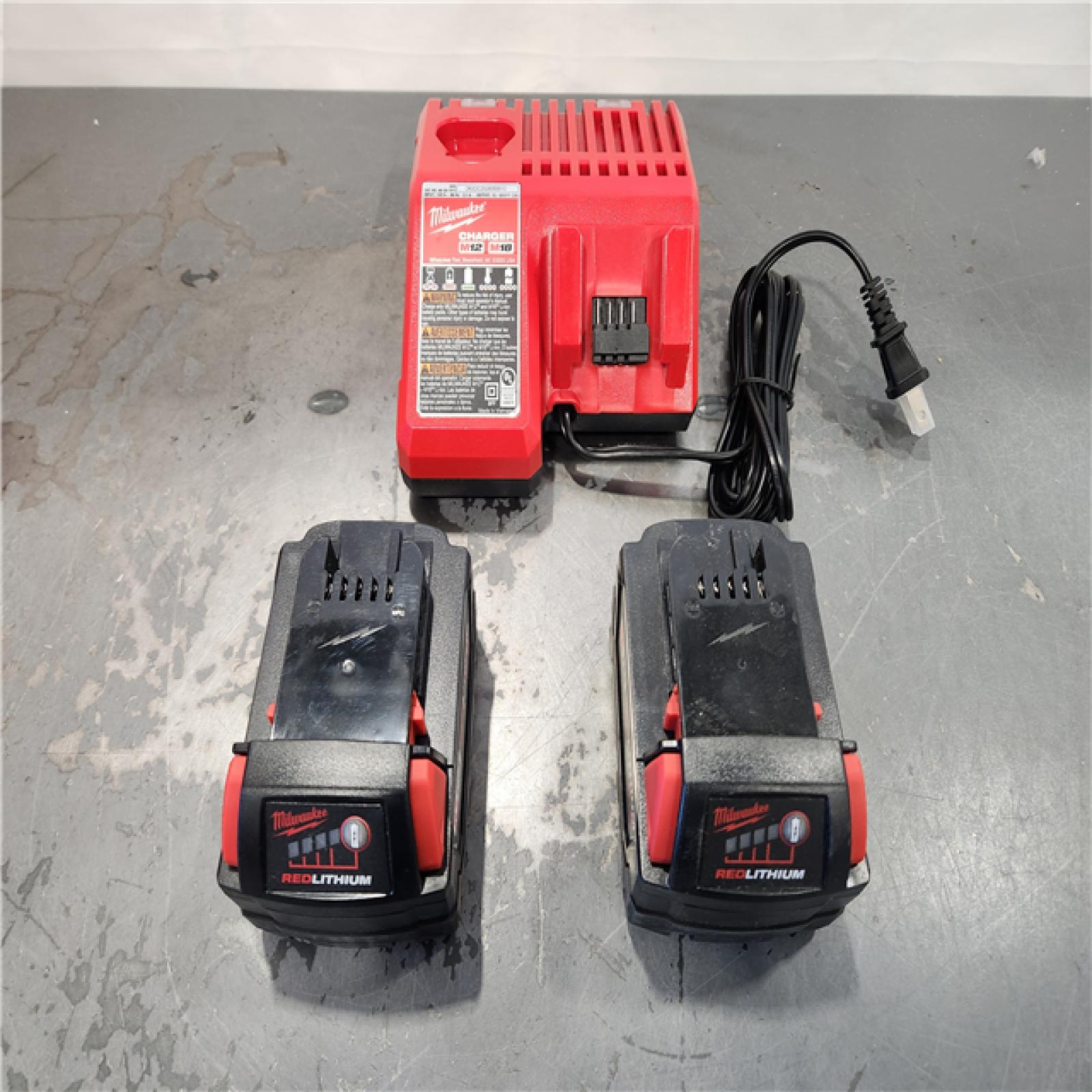 AS-IS- Milwaukee M18 18-Volt Lithium-Ion XC Starter Kit with Two 5.0Ah Batteries and Charger