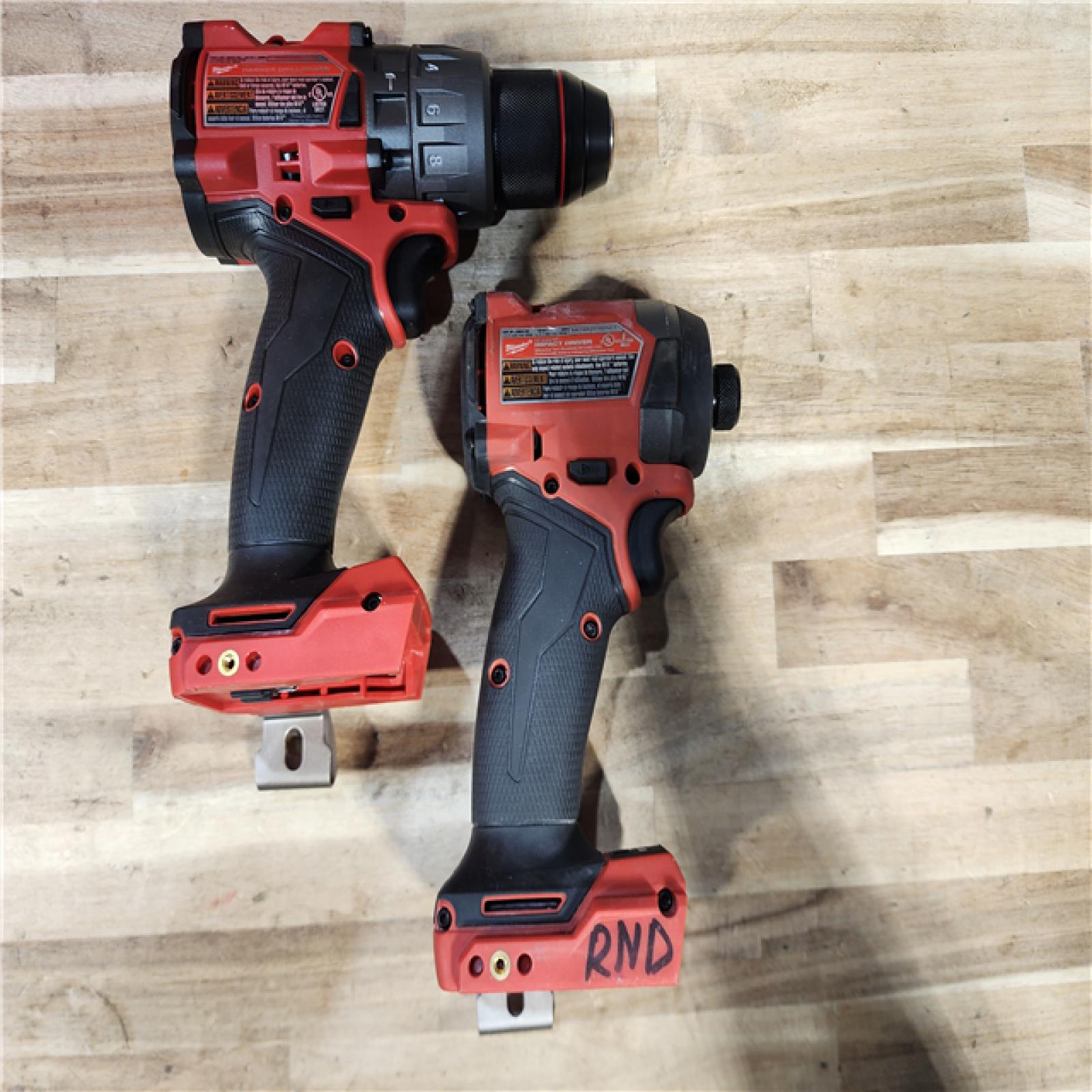 HOUSTON LOCATION - AS-IS Milwaukee FUEL 12-Volt Lithium-Ion Brushless Cordless Hammer Drill and Impact Driver Combo Kit