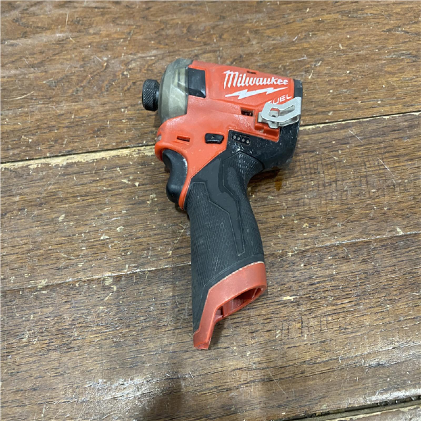 AS-IS M12 FUEL SURGE 12V Lithium-Ion Brushless Cordless 1/4 in. Hex Impact Driver Compact Kit W/Two 2.0Ah Batteries, Bag