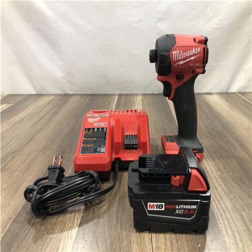 AS-IS  FUEL SURGE 18V Lithium-Ion Brushless Cordless 1/4 in. Hex Impact Driver Kit