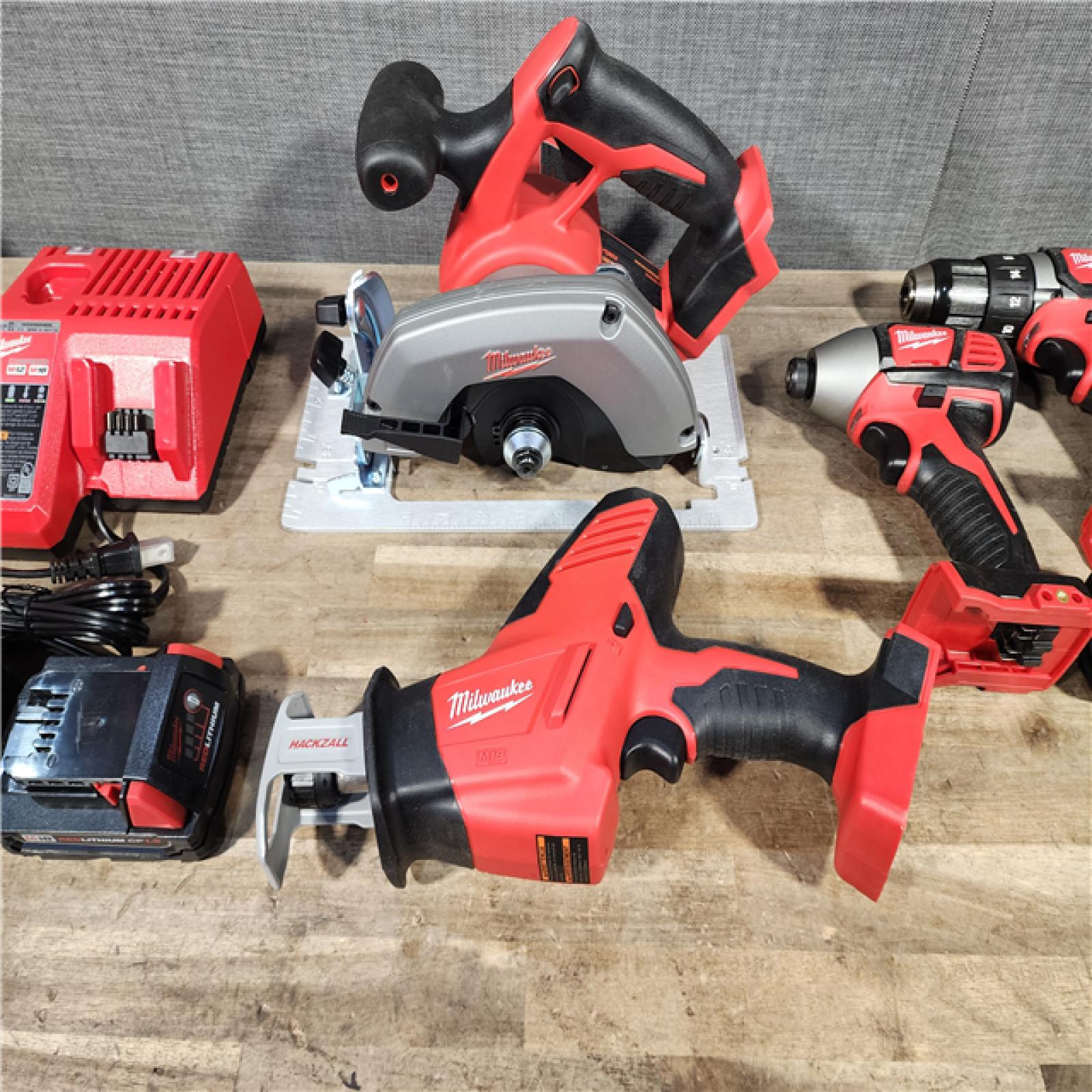 HOUSTON LOCATION - AS-IS M18 18V Lithium-Ion Cordless Combo Kit (5-Tool) with (2) BATTERY  (1) Charger  (1) Tool Bag