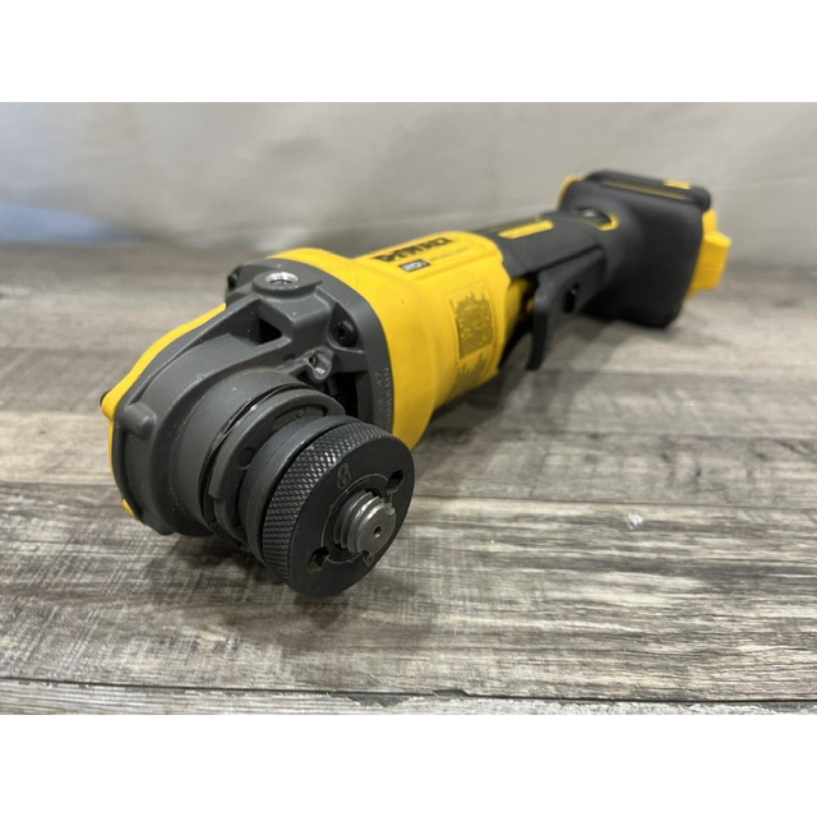 AS-IS DEWALT 20V MAX Cordless Brushless 4.5 - 5 in. Paddle Switch Angle Grinder with FLEXVOLT ADVANTAGE (Tool Only)