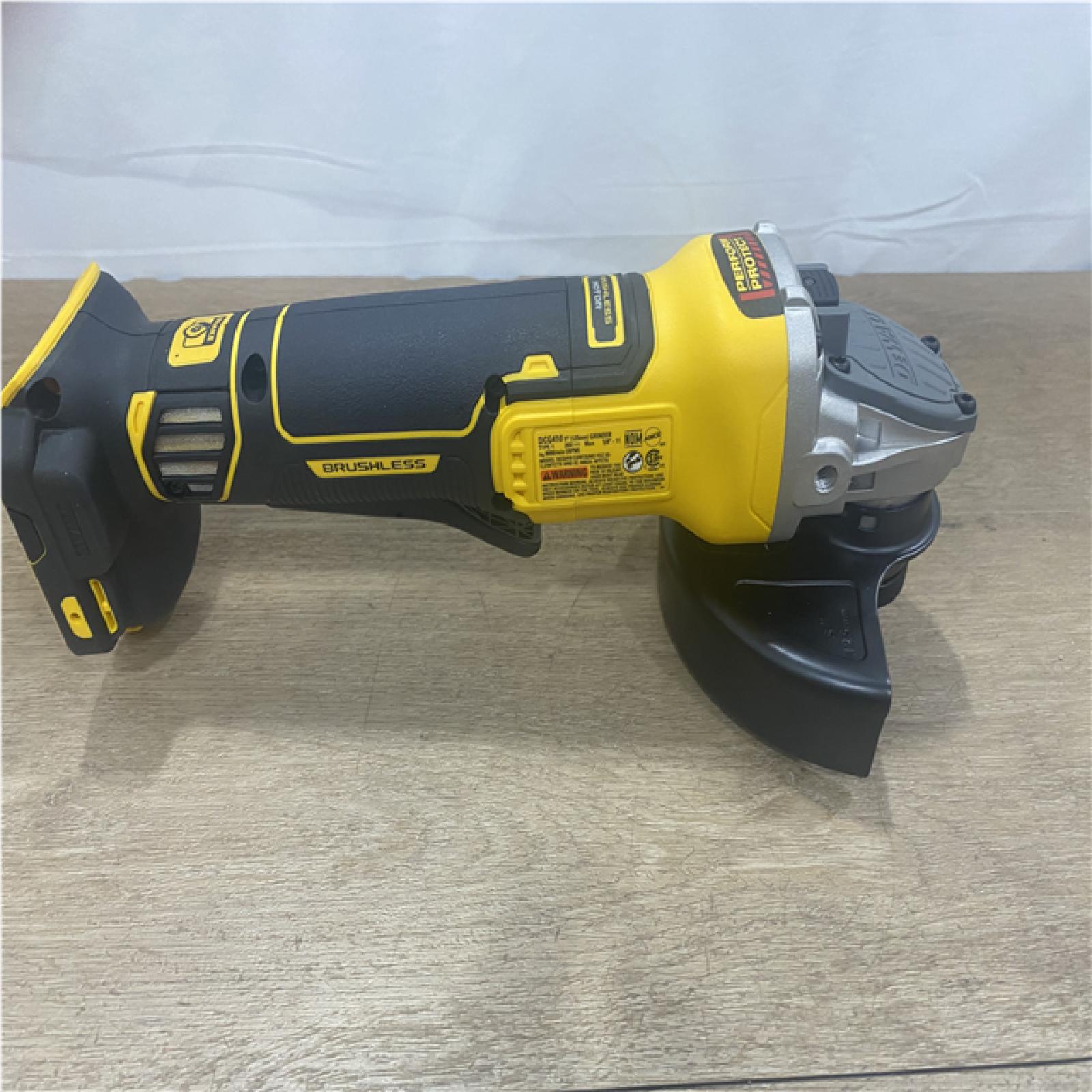 AS-IS DEWALT 20V XR Cordless 4-1/2. in. to 5 in. Variable Speed Angle Grinder (Tool Only)