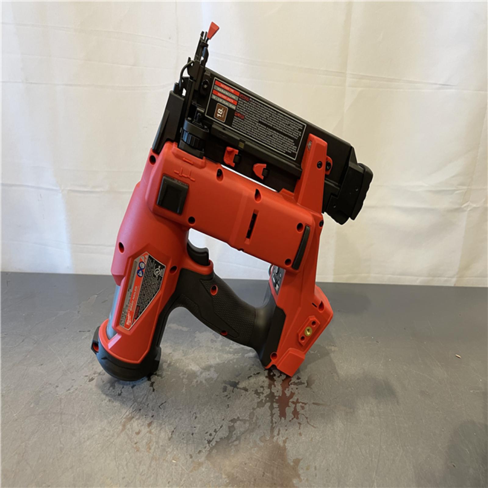 AS-IS - Milwaukee M18 FUEL 18-Volt Lithium-Ion Brushless Cordless Gen II 18-Gauge Brad Nailer