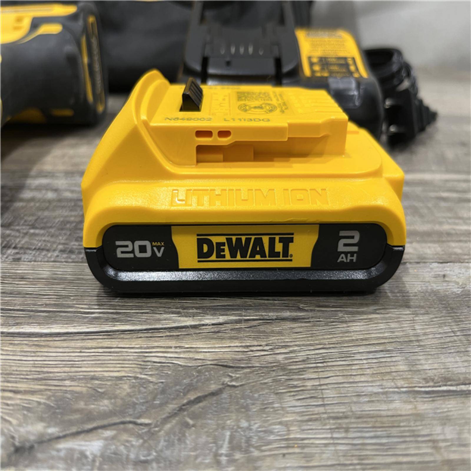 AS-IS DEWALT Atomic 20V Max Lithium-Ion Brushless Cordless Compact 1/4 in. Impact Driver Kit