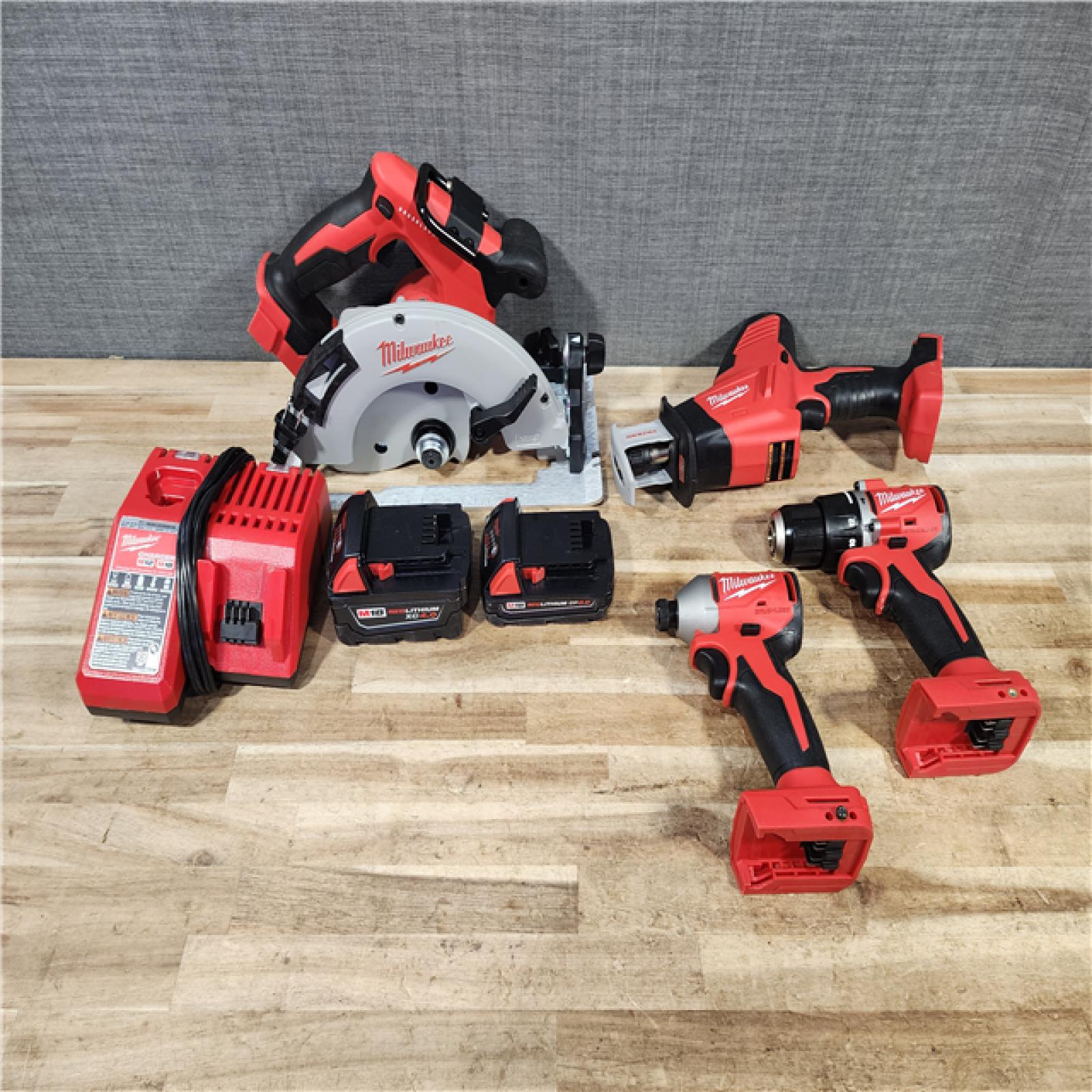 HOUSTON LOCATION - AS - IS Milwaukee 4 Tool Combo Kit W/ (2) Battery & Charger
