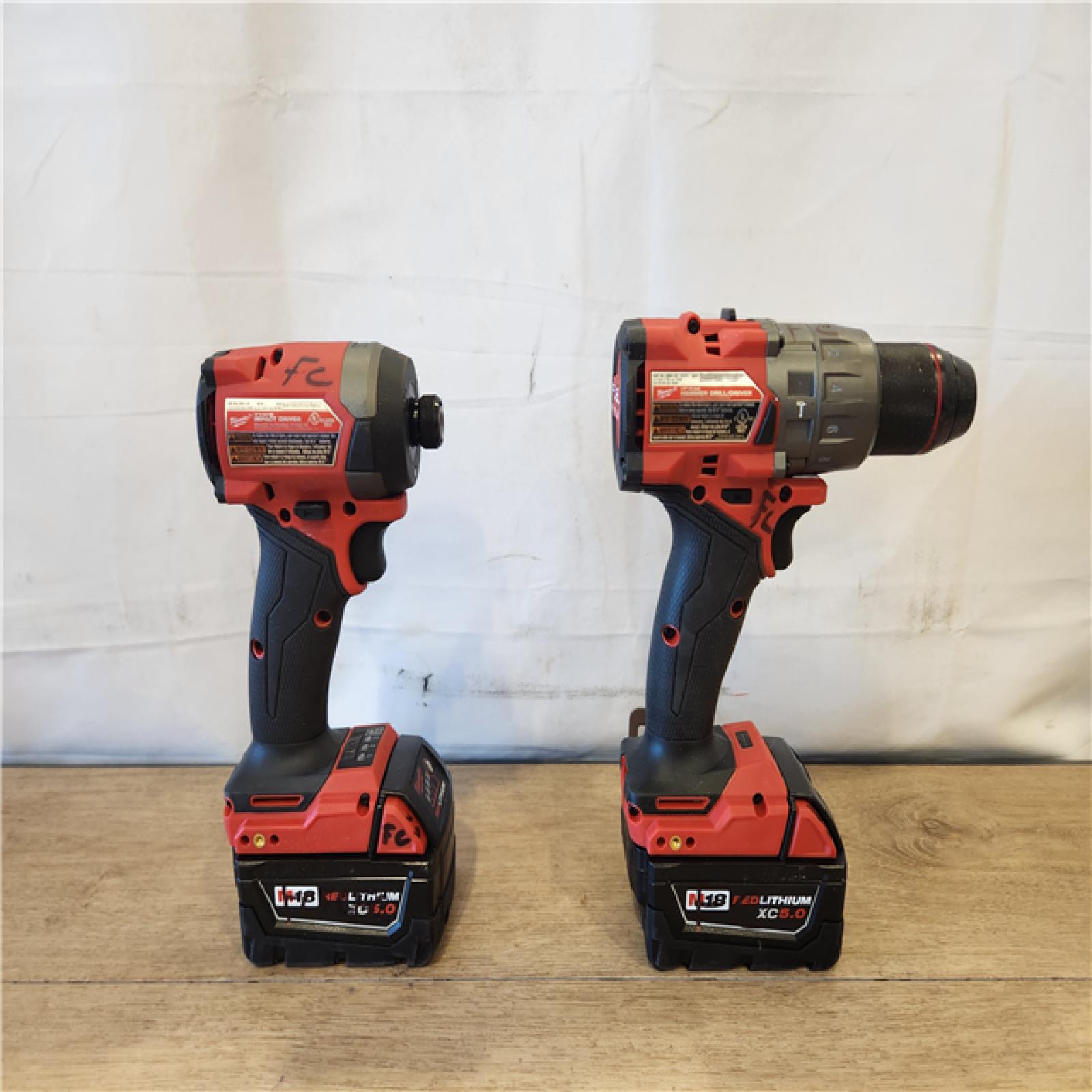 AS-IS- Milwaukee FUEL 18V Lithium-Ion Brushless Cordless Hammer Drill and Impact Driver Combo Kit