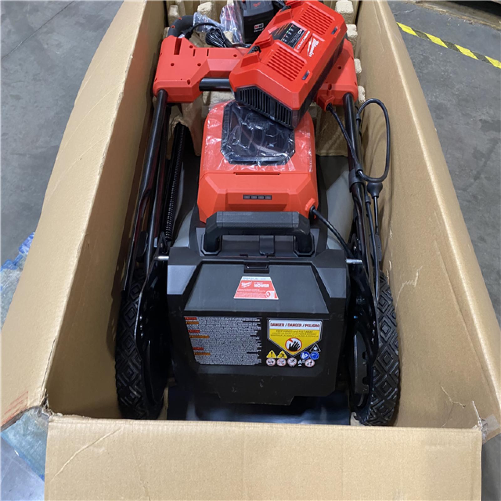 Dallas Location - As-Is 	Milwaukee M18 FUEL Brushless Cordless 21 in. Walk Behind Dual Battery Self-Propelled Mower Kit