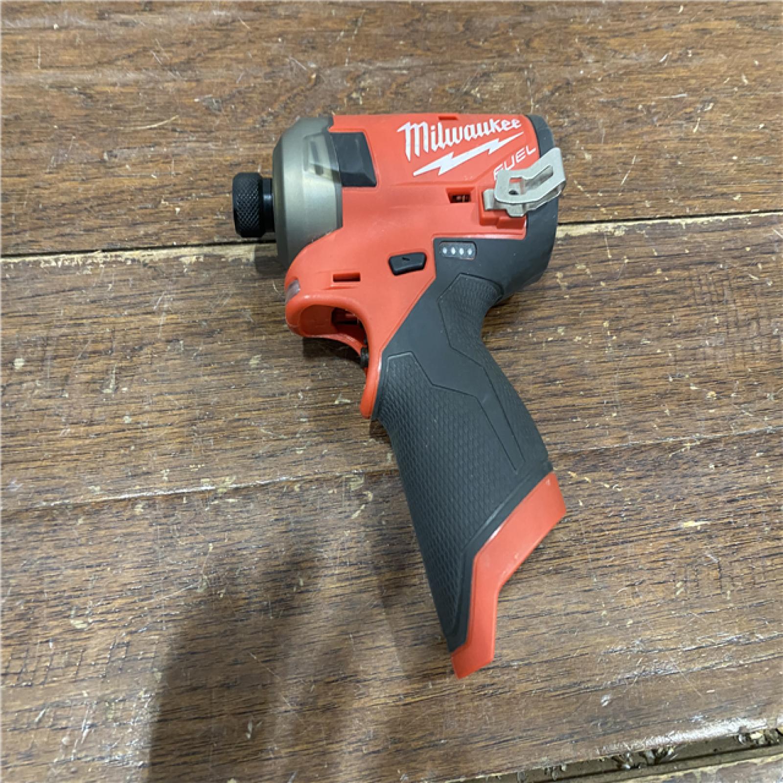 AS-IS M12 FUEL SURGE 12V Lithium-Ion Brushless Cordless 1/4 in. Hex Impact Driver Compact Kit W/Two 2.0Ah Batteries, Bag