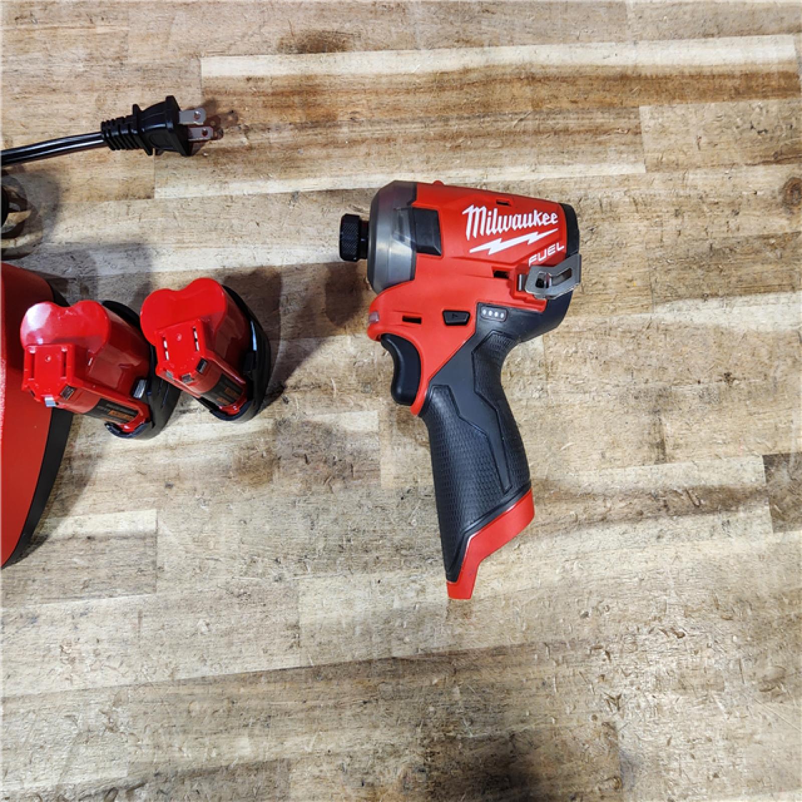 HOUSTON LOCATION - AS - IS Milwaukee FUEL SURGE 12V Lithium-Ion Brushless Cordless 1/4 in. Hex Impact Driver Compact Kit