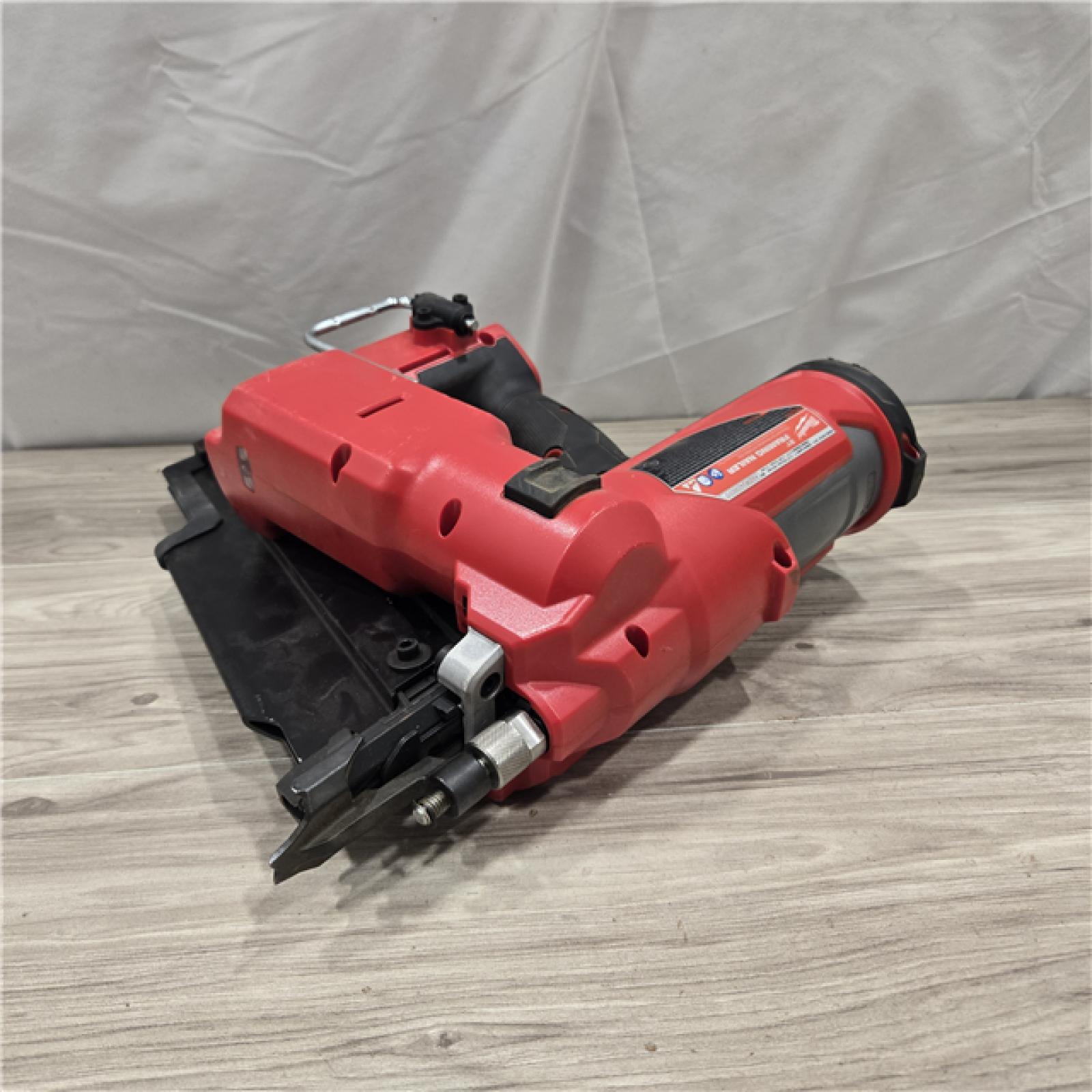AS-IS Milwaukee 2744-20 M18 FUEL 3-1/2 in. 18V 21-Degree Cordless Framing Nailer (Tool-Only)