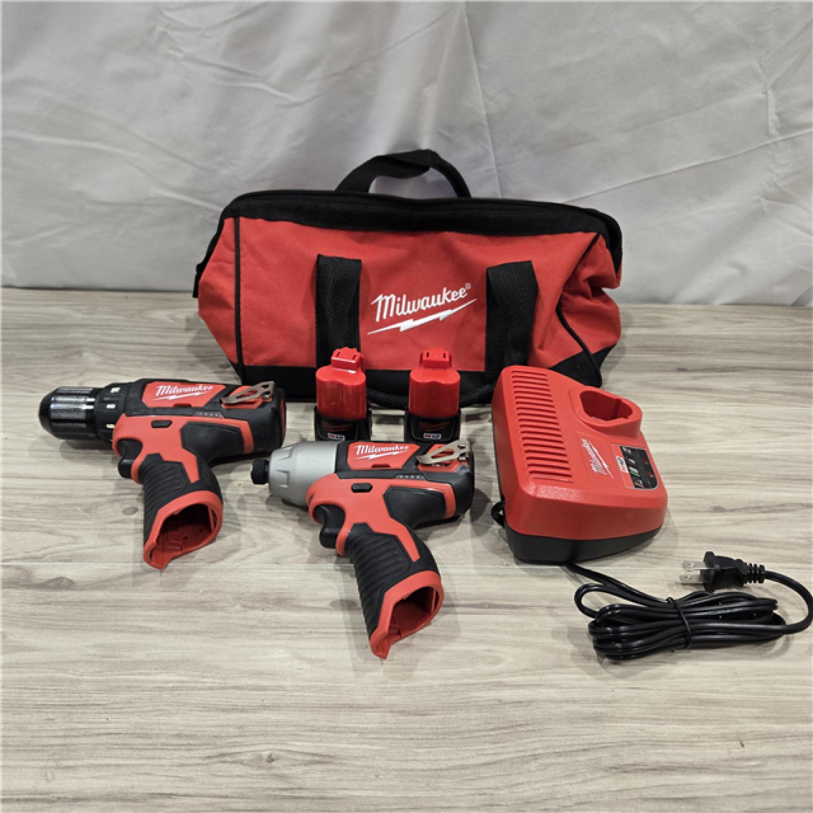 AS-IS Milwaukee 2494-22 M12 Cordless Combination 3/8  Drill / Driver and 1/4  Hex Impact Driver Dual Power Tool Kit