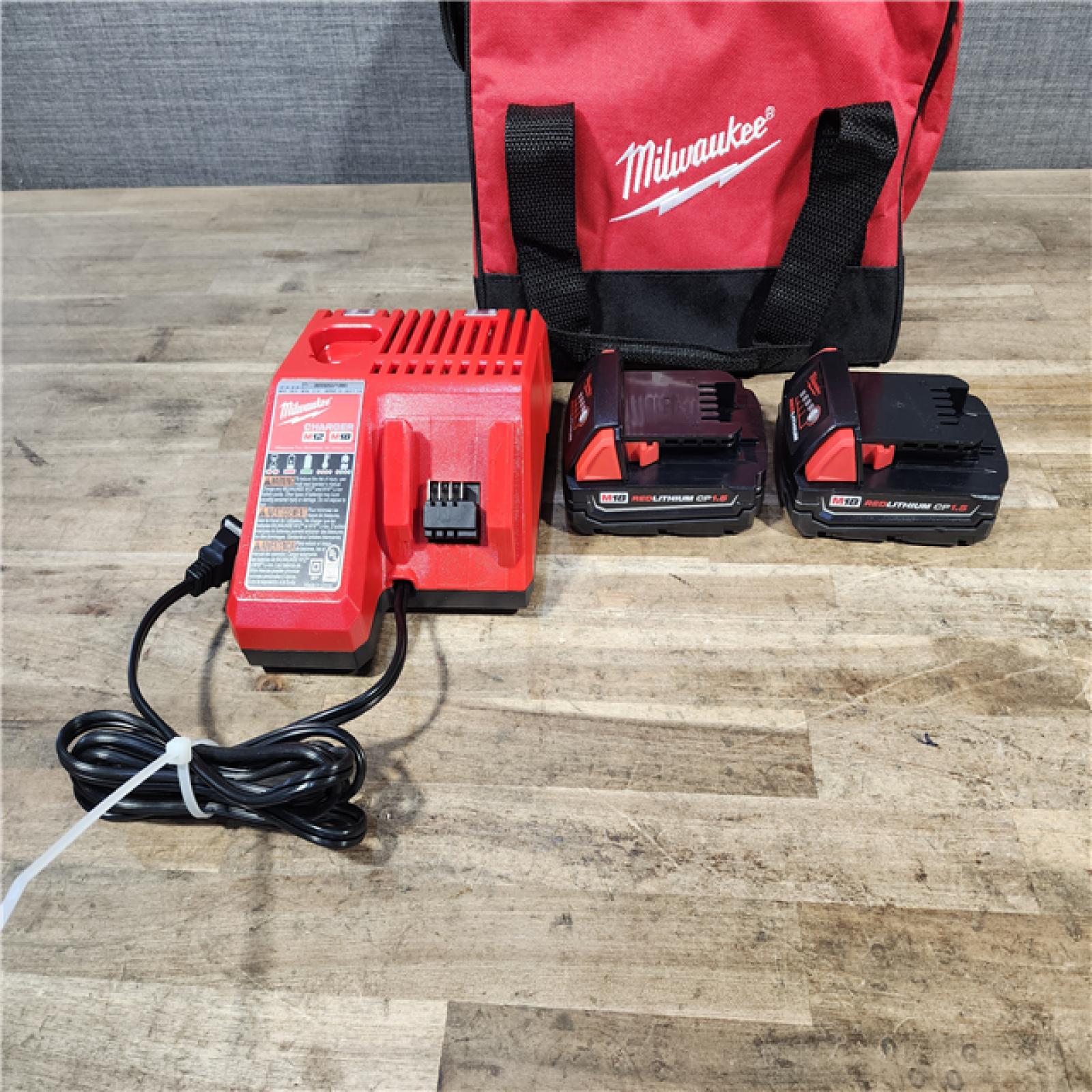 HOUSTON LOCATION - AS-IS Milwaukee M18 Brushed Cordless (2-Tool) Drill/Driver and Impact Driver Kit