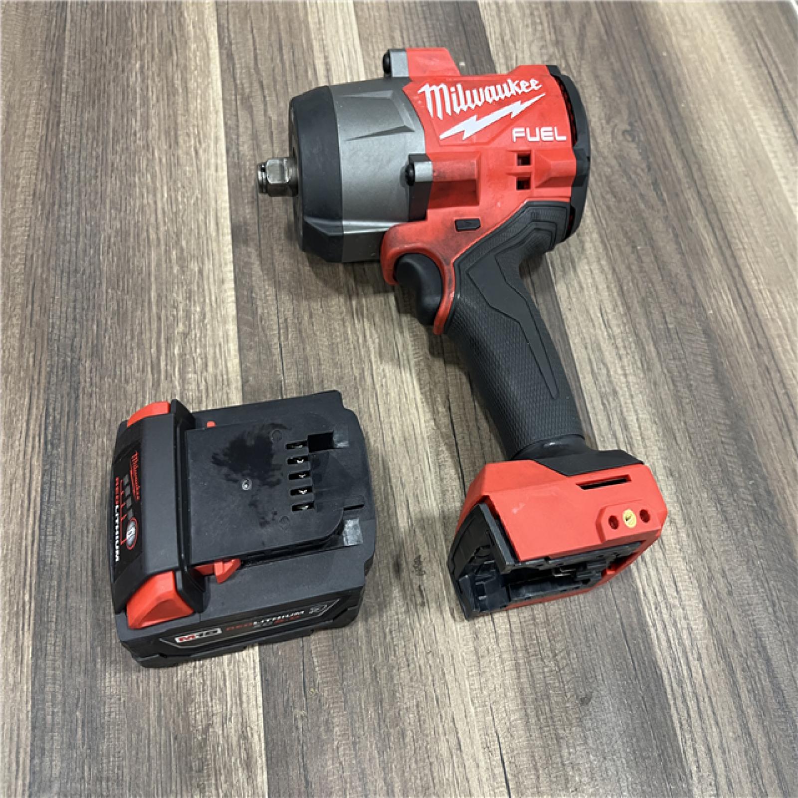 AS-IS Milwaukee 2663-20 1/2  Impact Wrench 48-11-1850 5Ah Battery  48-59-1812 Charger